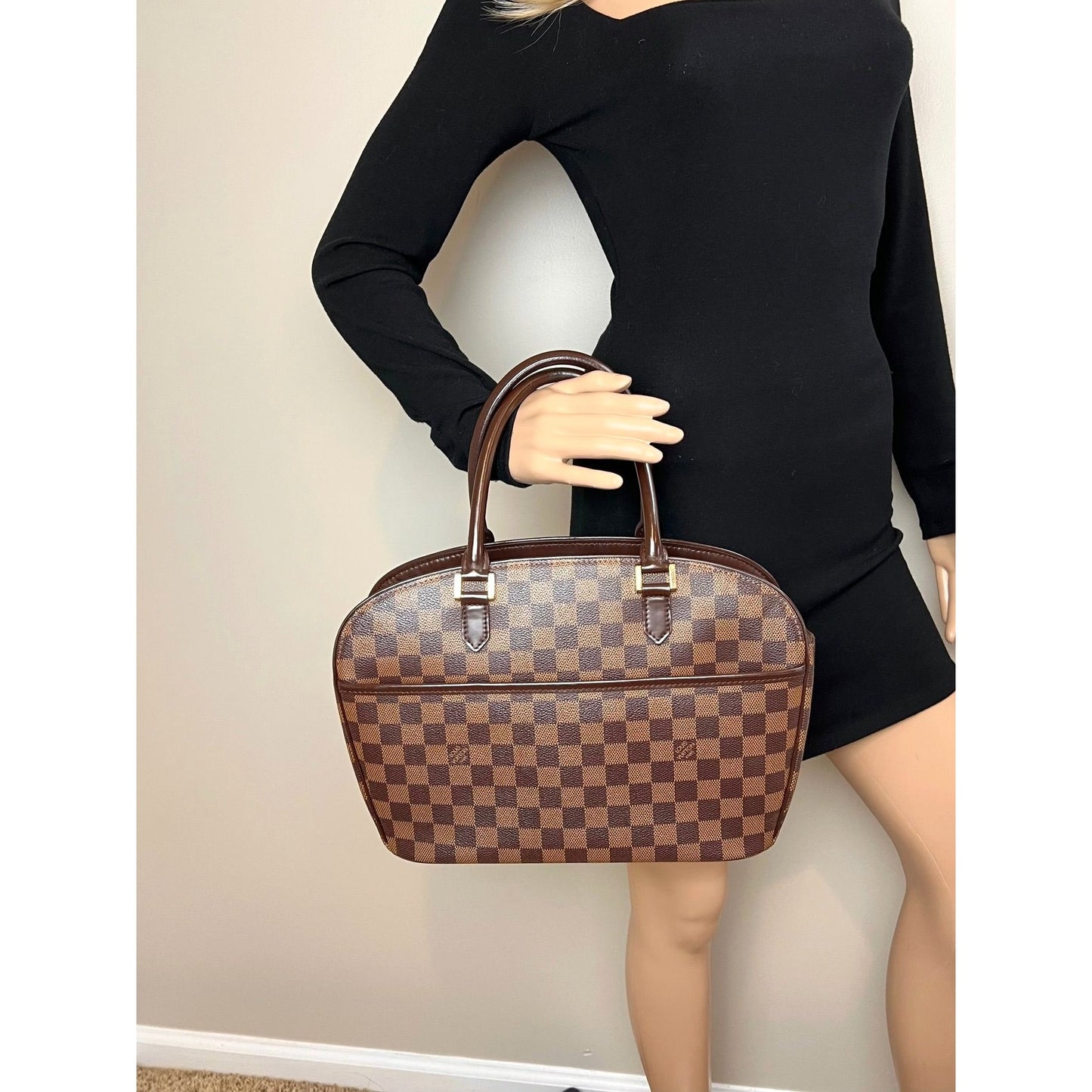 
                  
                    Louis Vuitton Vintage Sarria Horizontal Damier Ebene Hand Bag
                  
                