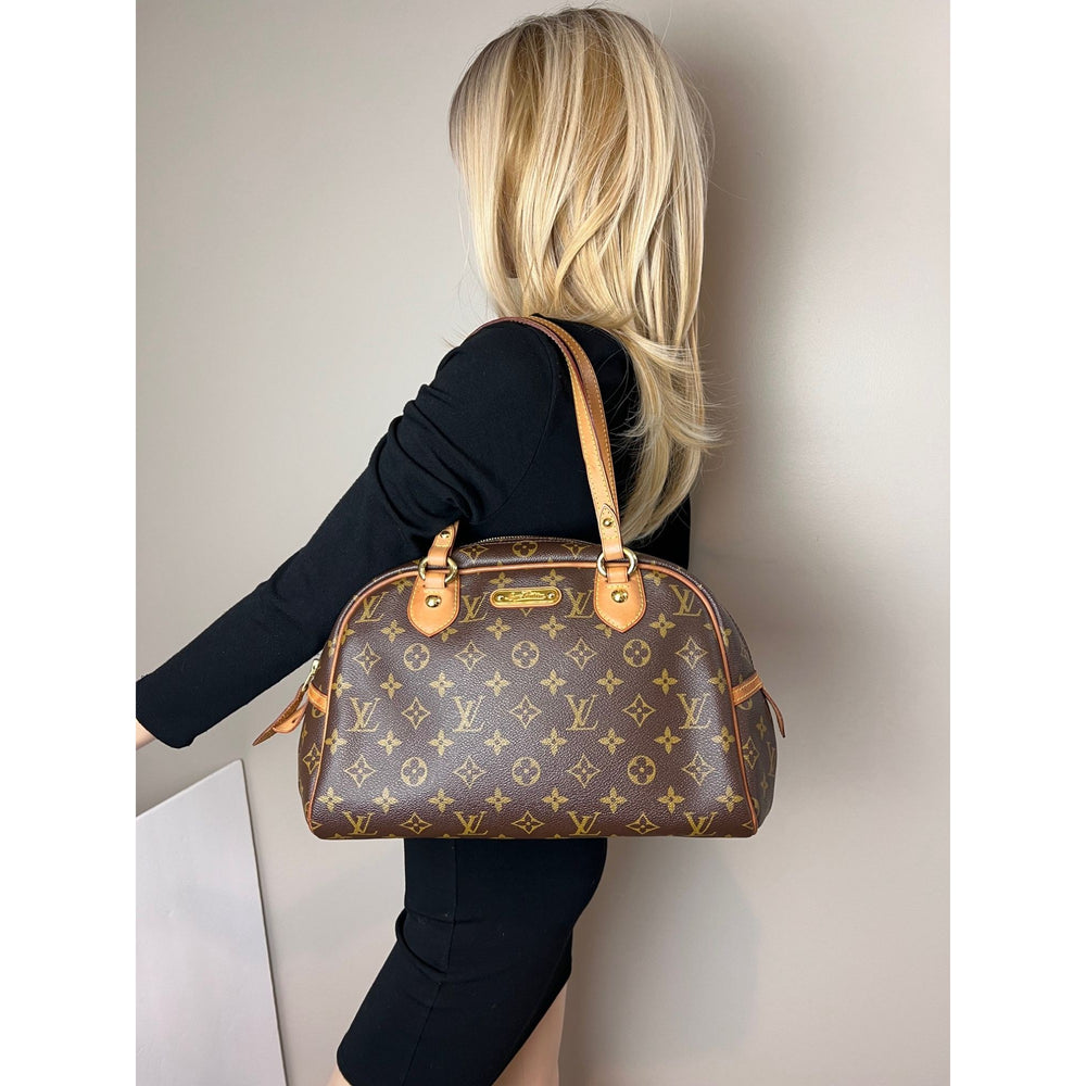 
                  
                    LOUIS VUITTON Monogram Canvas Montorgueil PM Shoulder Bag
                  
                