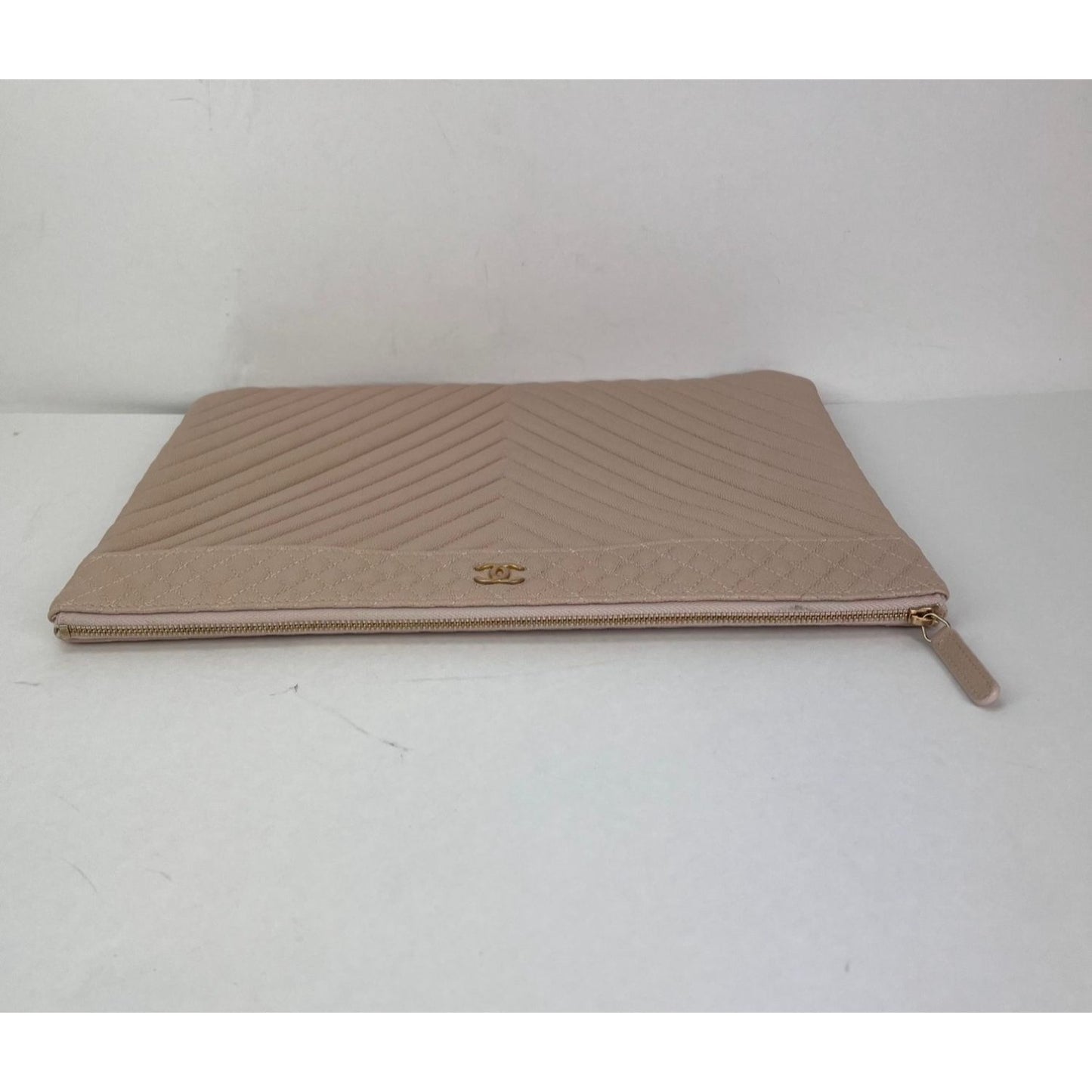 
                  
                    Chanel Caviar Chevron Quilted Large Beige Leather Cosmetic Clutch Bag
                  
                
