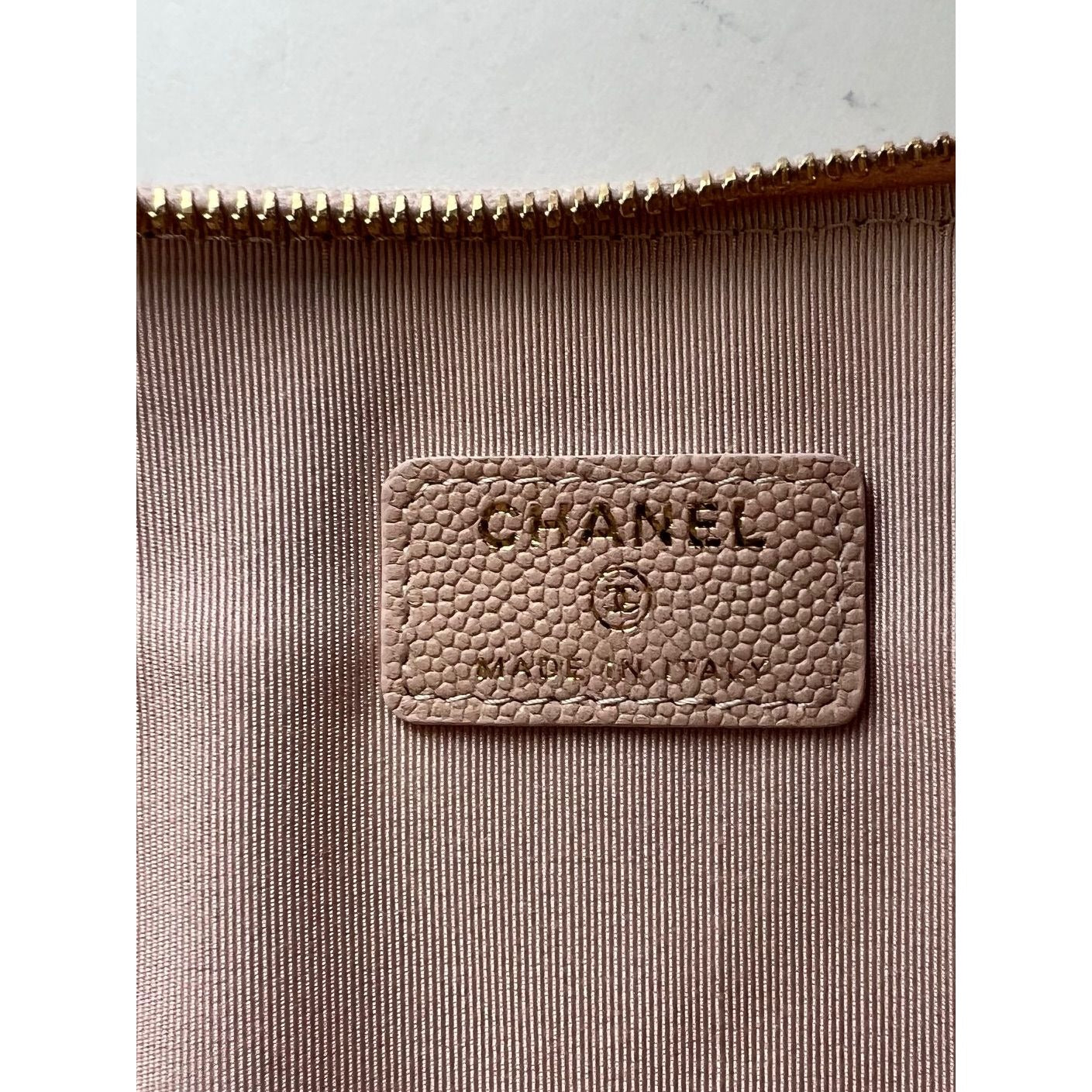 
                  
                    Chanel Caviar Chevron Quilted Large Beige Leather Cosmetic Clutch Bag
                  
                