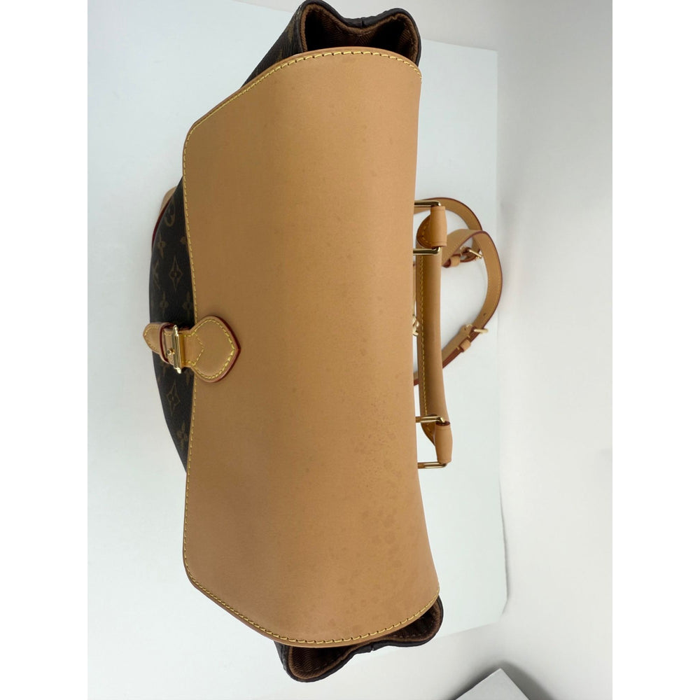 
                  
                    Louis Vuitton Soho MM Monogram Backpack
                  
                