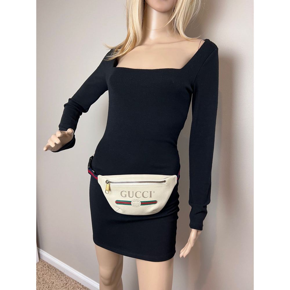 
                  
                    Gucci Logo White Leather Web Belt Sling Bag
                  
                