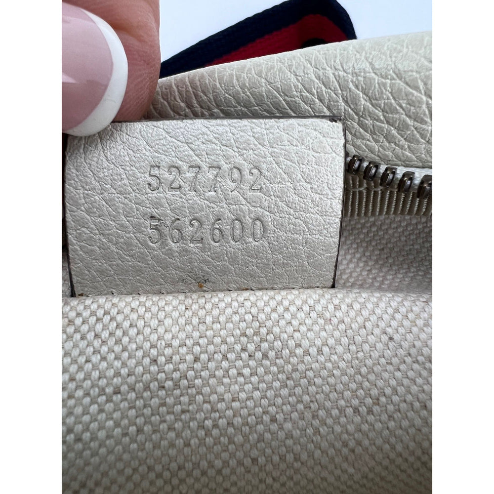 
                  
                    Gucci Logo White Leather Web Belt Sling Bag
                  
                