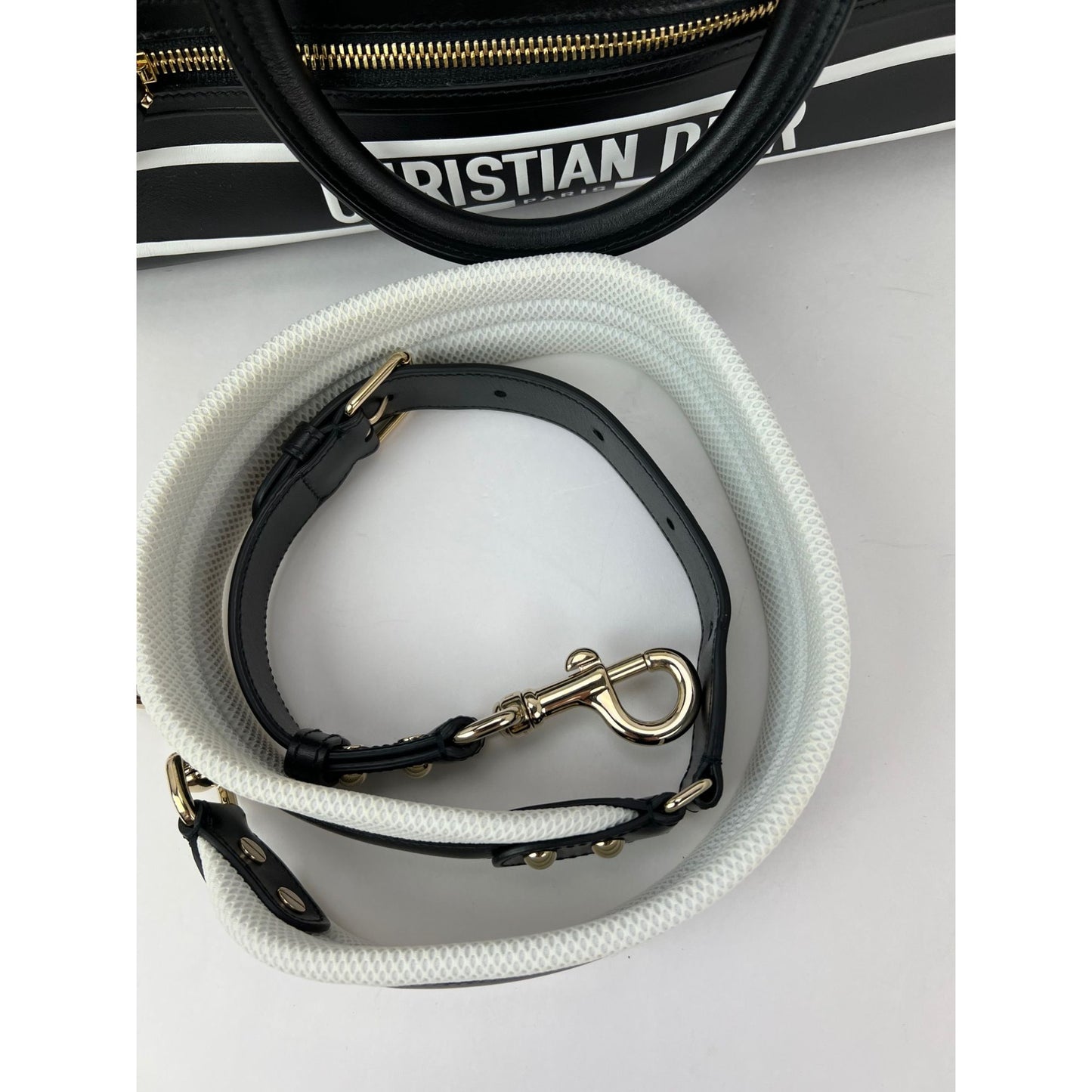 
                  
                    Christian Dior Lambskin Cannage Medium Dior Vibe Zip Bowling Bag
                  
                