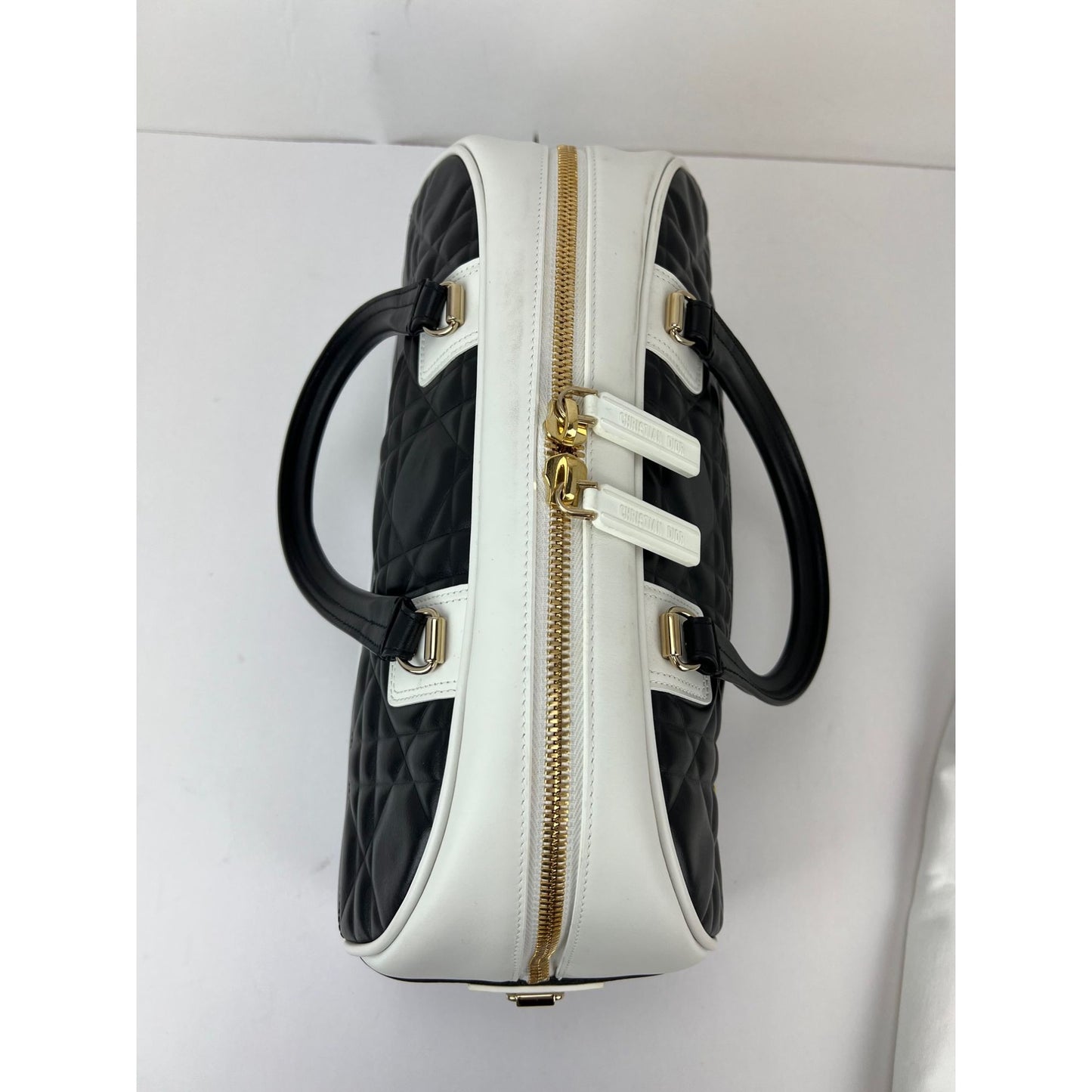 
                  
                    Christian Dior Lambskin Cannage Medium Dior Vibe Zip Bowling Bag
                  
                