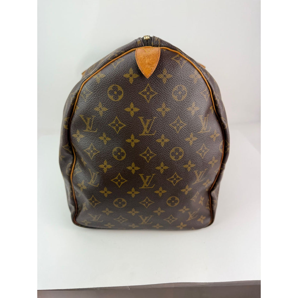 
                  
                    Louis Vuitton Keepall 55 Monogram Canvas Duffle Bag Luggage
                  
                