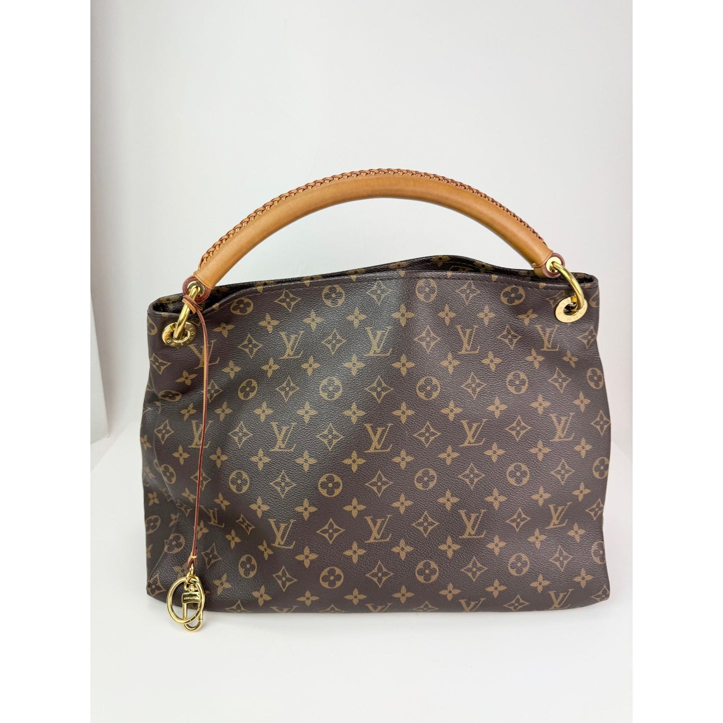 
                  
                    Louis Vuitton Artsy MM Canvas Monogram Hand Tote Bag
                  
                