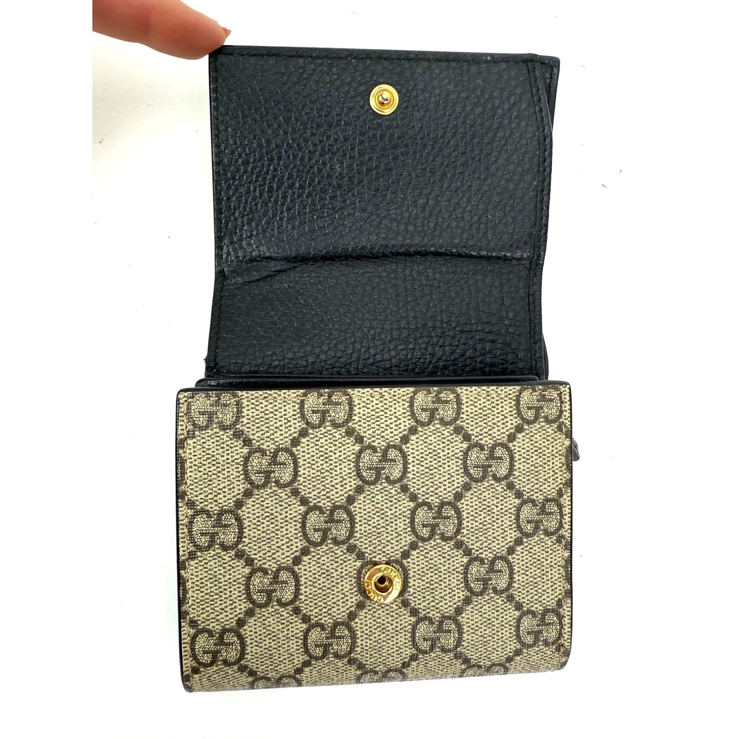 
                  
                    Gucci GG Supreme Compact Black Leather Wallet
                  
                