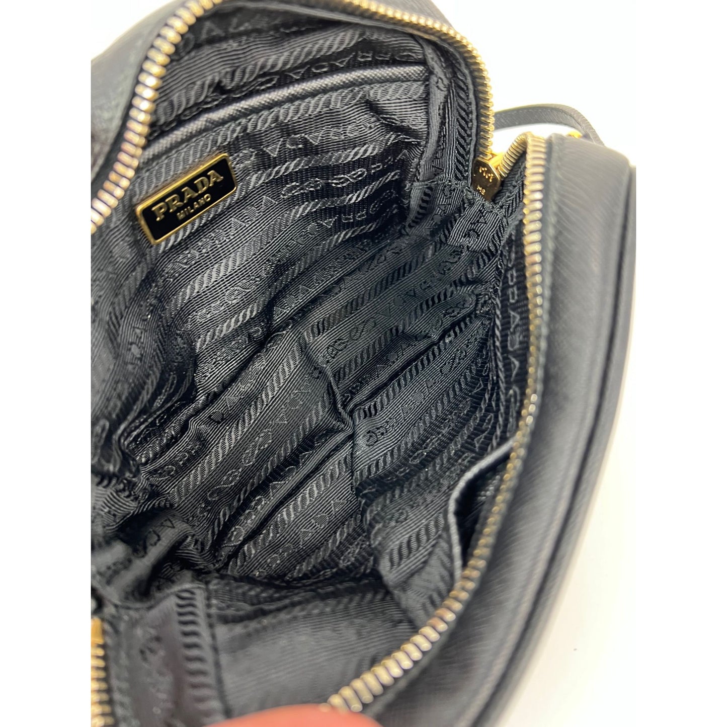 
                  
                    Prada Black Mini Camera Black Saffiano Leather Crossbody Bag
                  
                