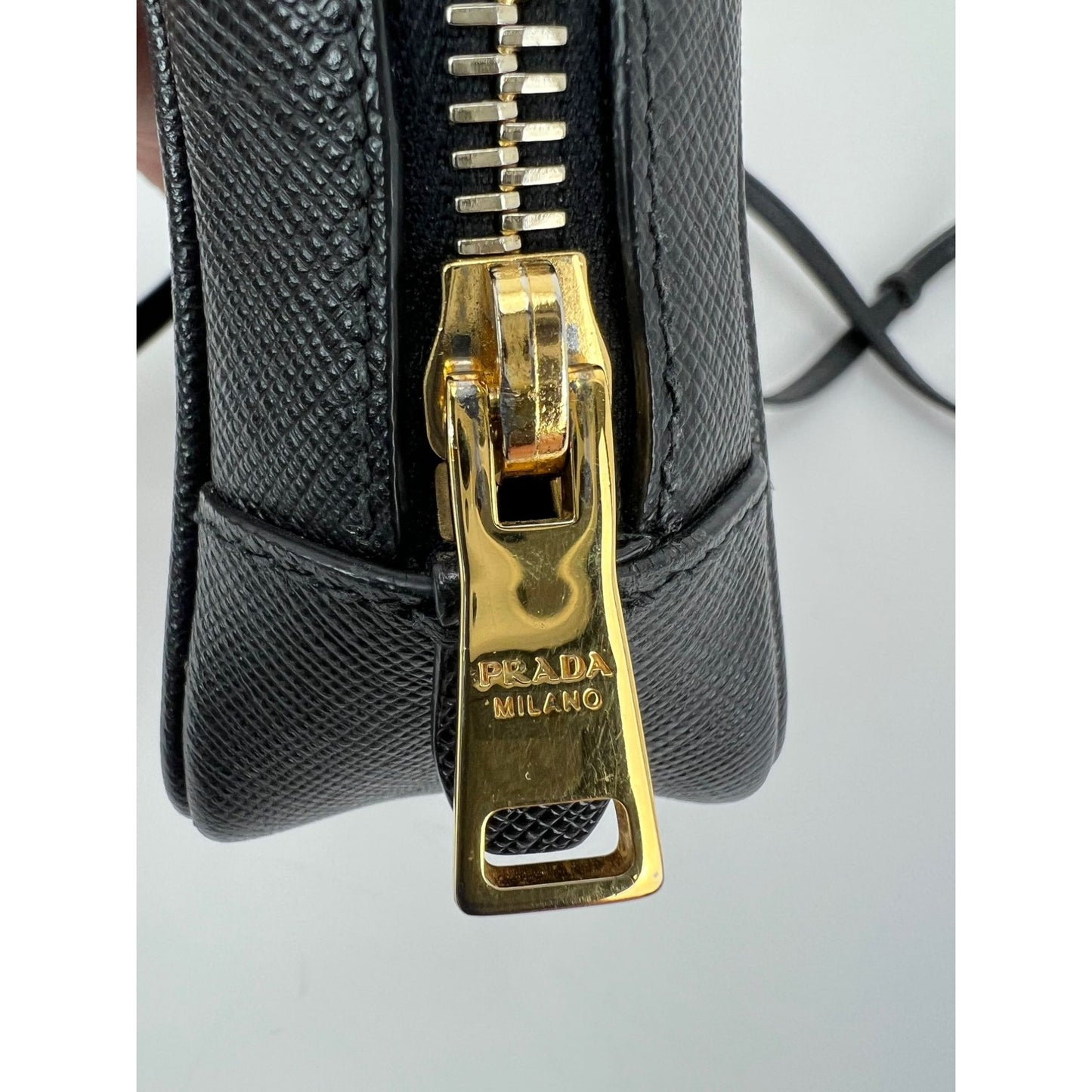 
                  
                    Prada Black Mini Camera Black Saffiano Leather Crossbody Bag
                  
                