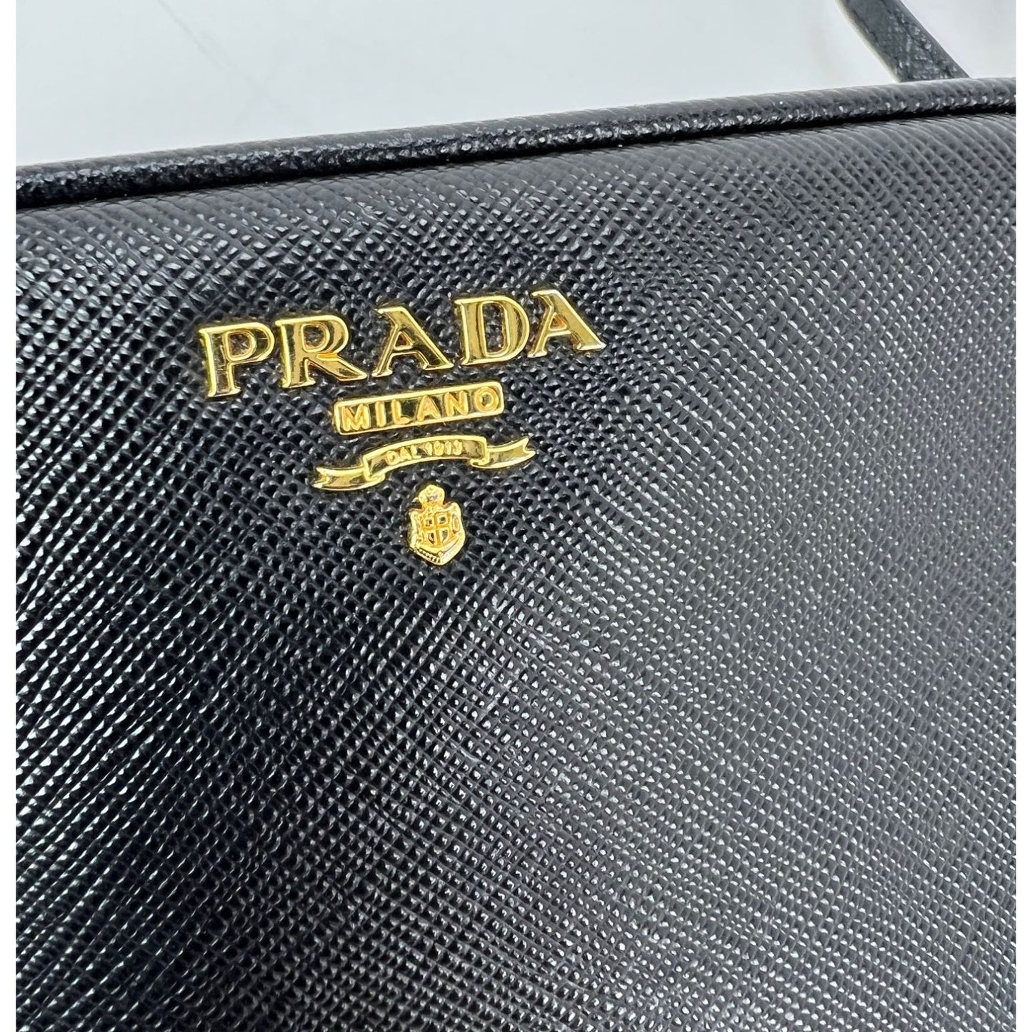 
                  
                    Prada Black Mini Camera Black Saffiano Leather Crossbody Bag
                  
                
