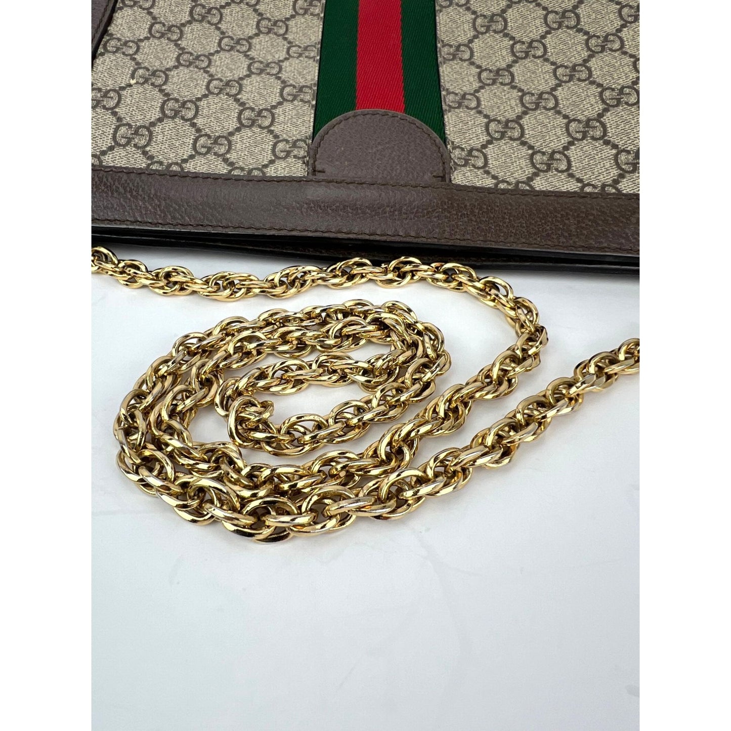 
                  
                    Gucci Ophidia GG Supreme Small Web Chain Shoulder Bag
                  
                