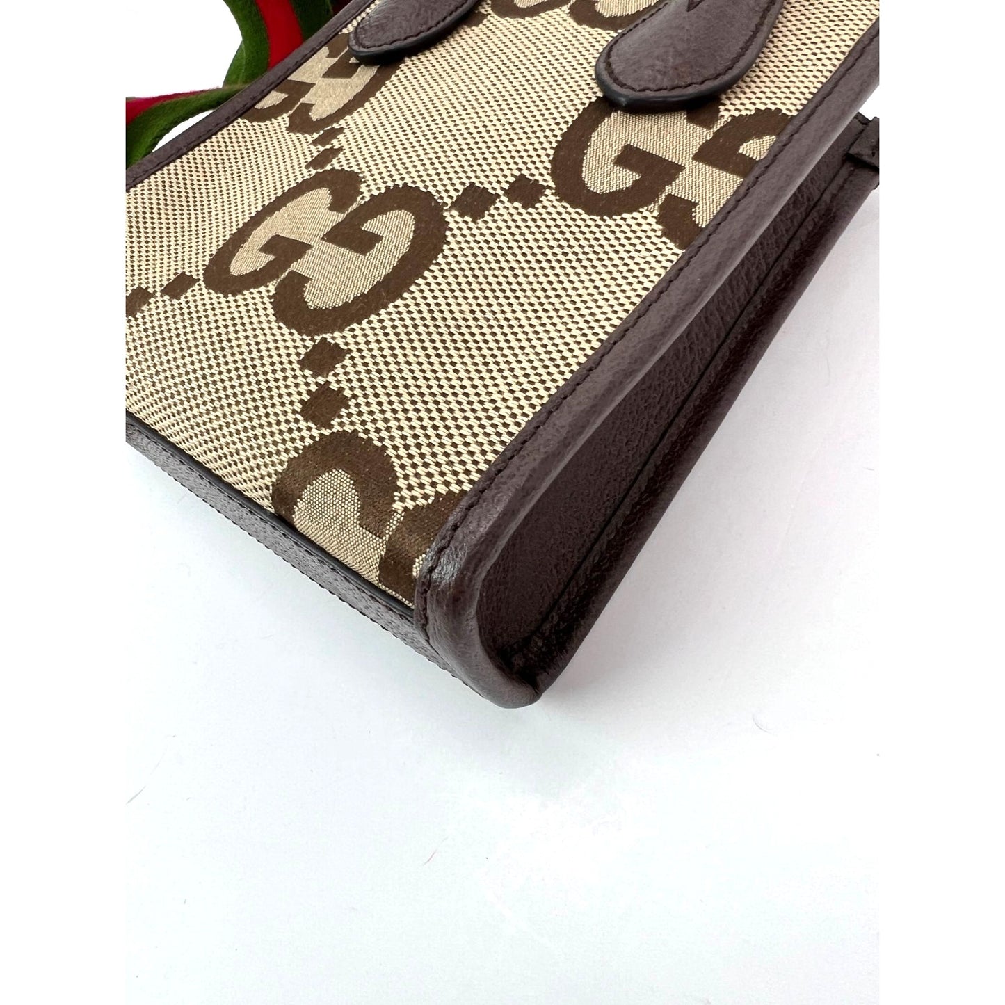 
                  
                    Gucci Jumbo GG textured dollar calfskin Mini Web Vertical Tote
                  
                