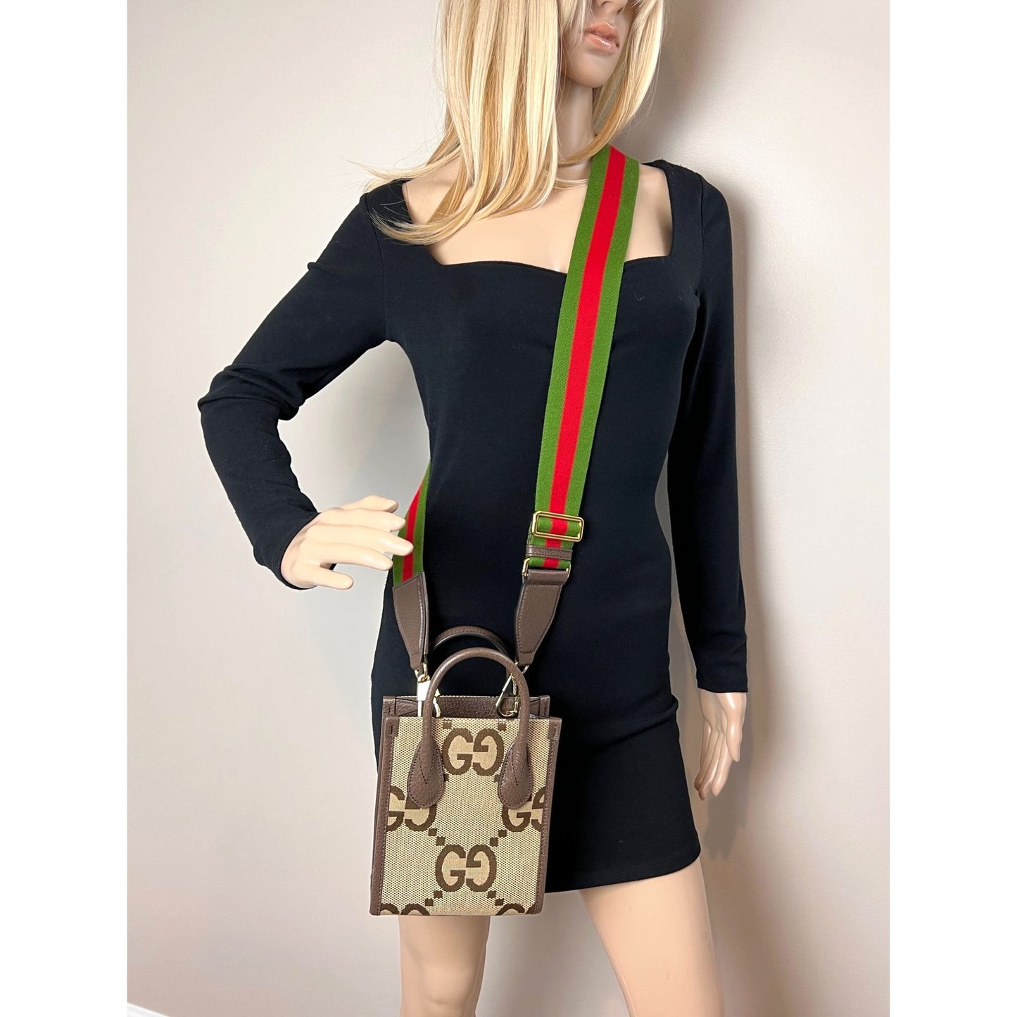 
                  
                    Gucci Jumbo GG textured dollar calfskin Mini Web Vertical Tote
                  
                