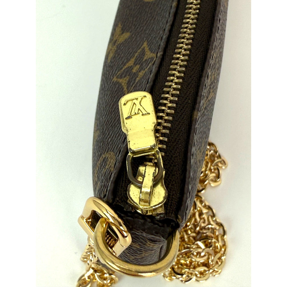 
                  
                    Louis Vuitton Vintage Monogram Pochette Bag
                  
                
