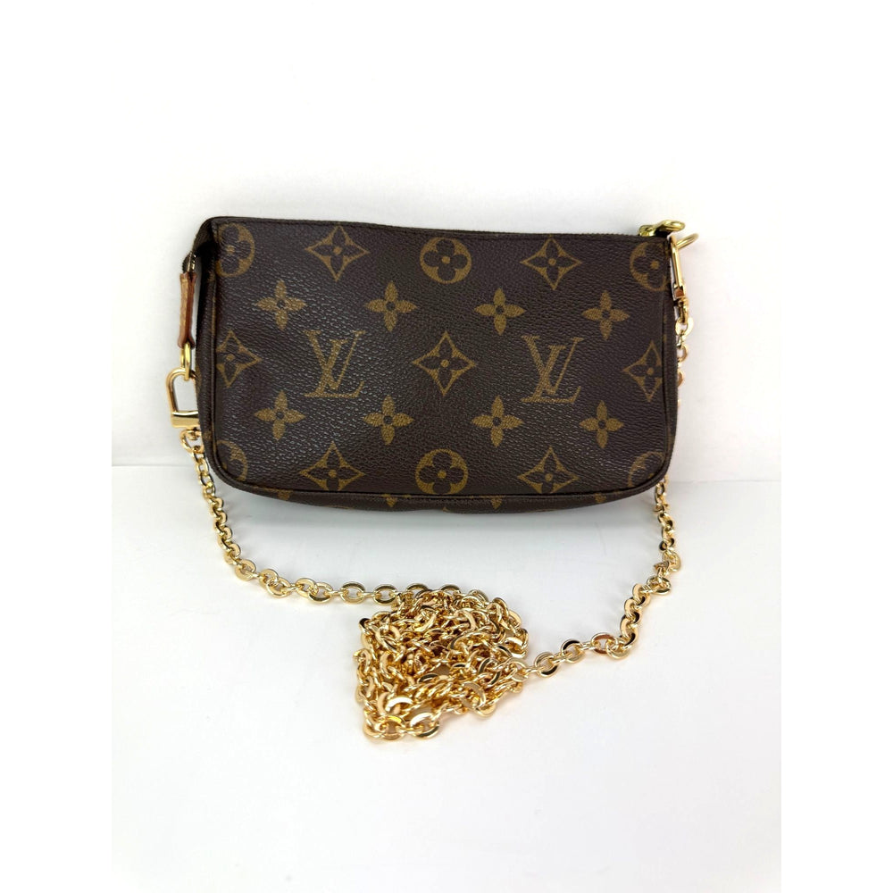 
                  
                    Louis Vuitton Vintage Monogram Pochette Bag
                  
                