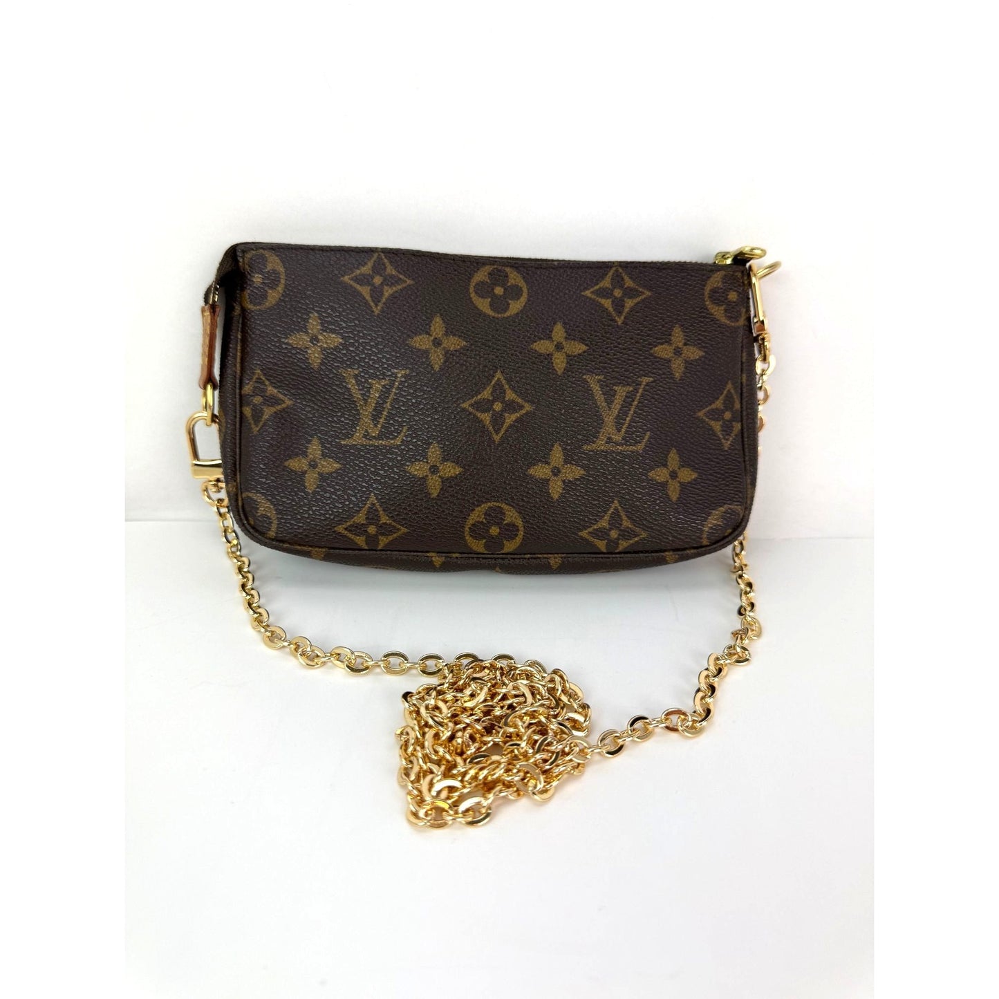 
                  
                    Louis Vuitton Vintage Monogram Pochette Bag
                  
                