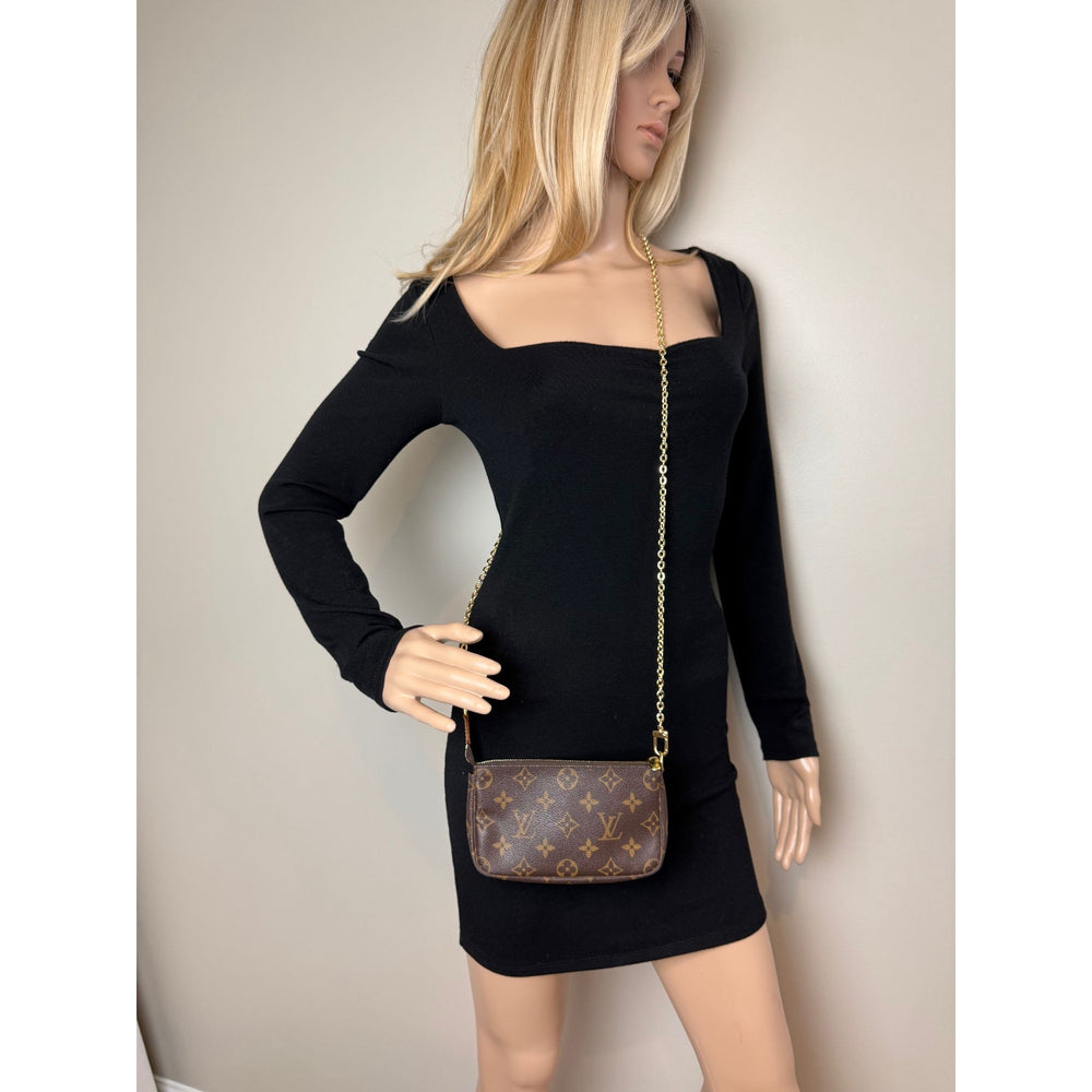 
                  
                    Louis Vuitton Vintage Monogram Pochette Bag
                  
                