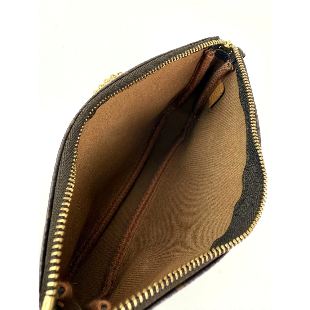 
                  
                    Louis Vuitton Vintage Monogram Pochette Bag
                  
                