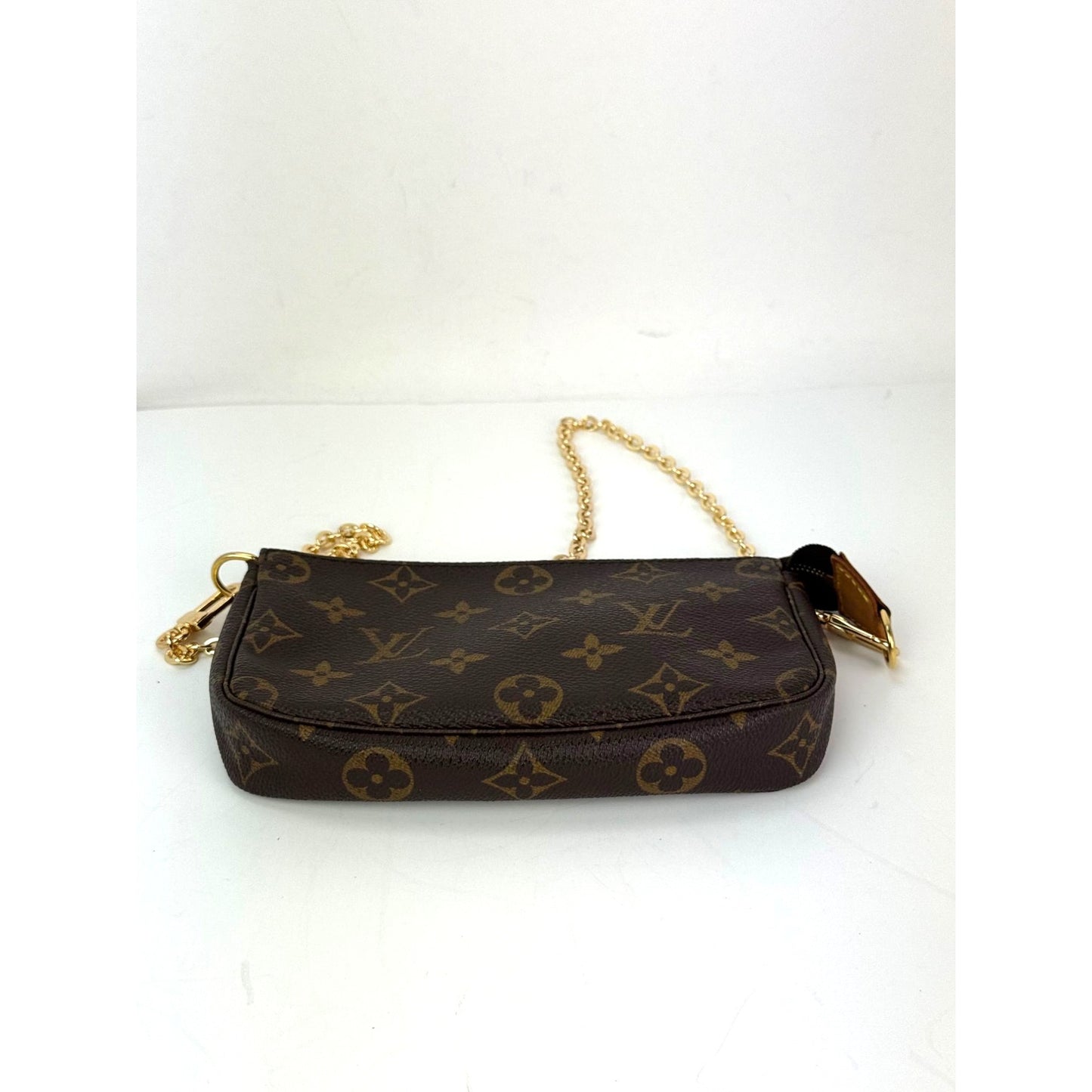
                  
                    Louis Vuitton Vintage Monogram Pochette Bag
                  
                
