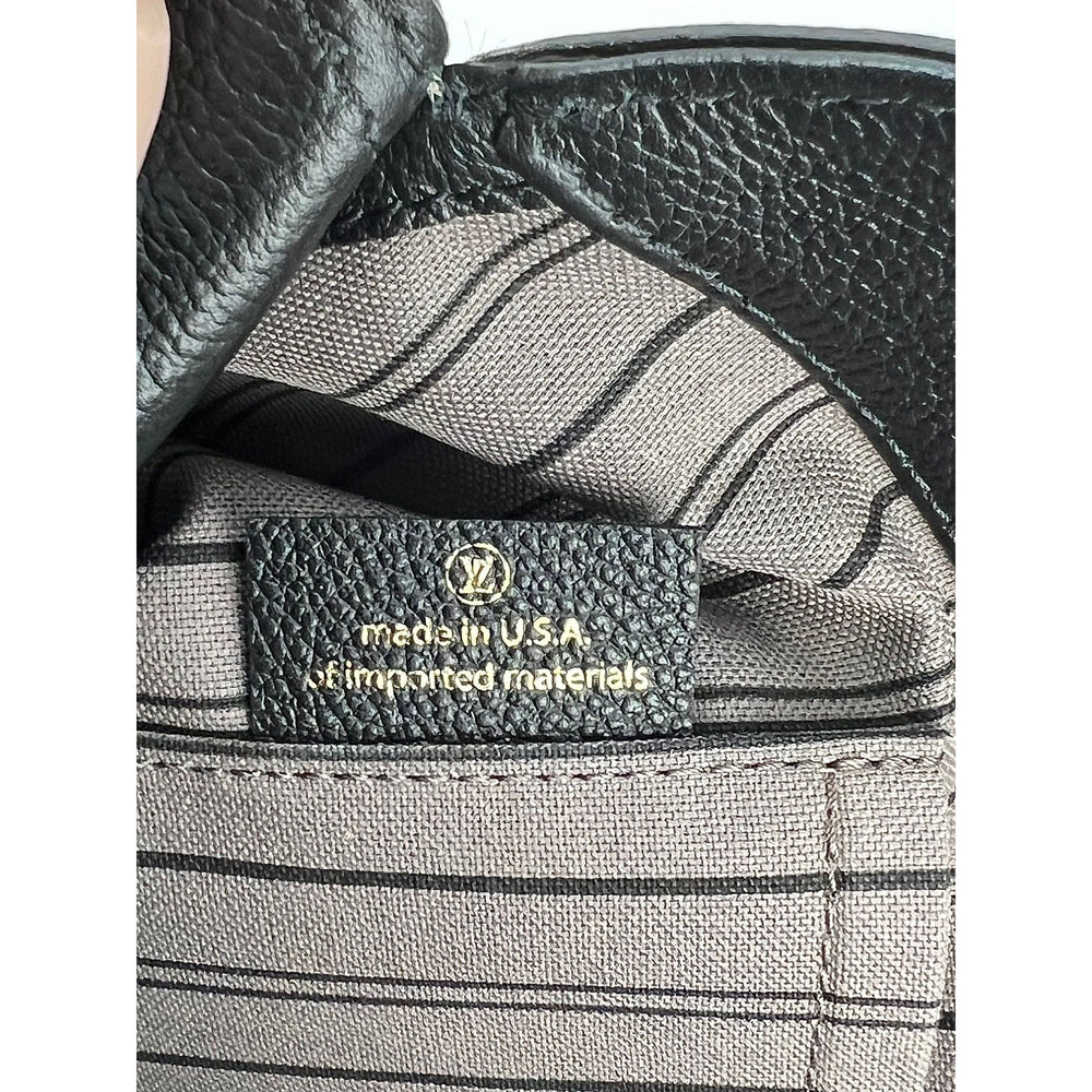 
                  
                    Louis Vuitton Montaigne MM Empreinte Black Leather Shoulder Bag
                  
                