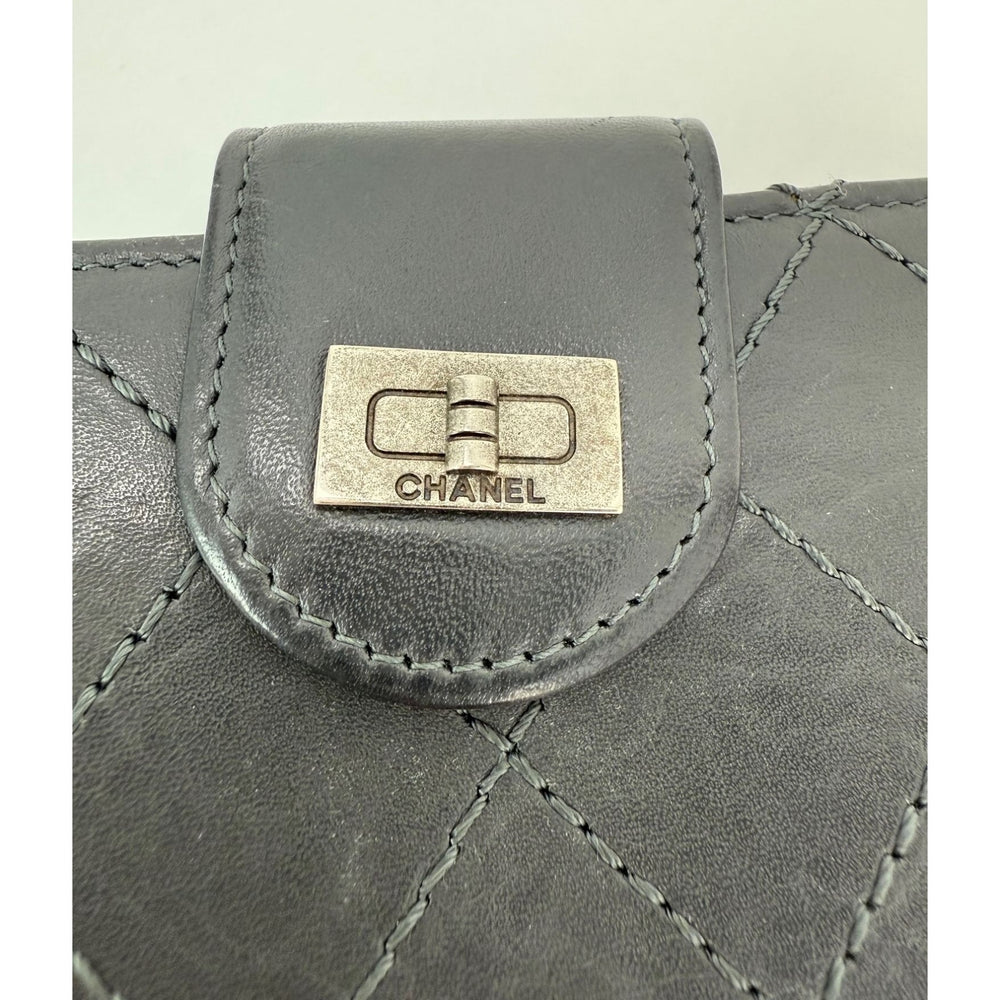 
                  
                    Chanel aged calfskin 2.55 Reissue Zip Gray Compact Wallet
                  
                