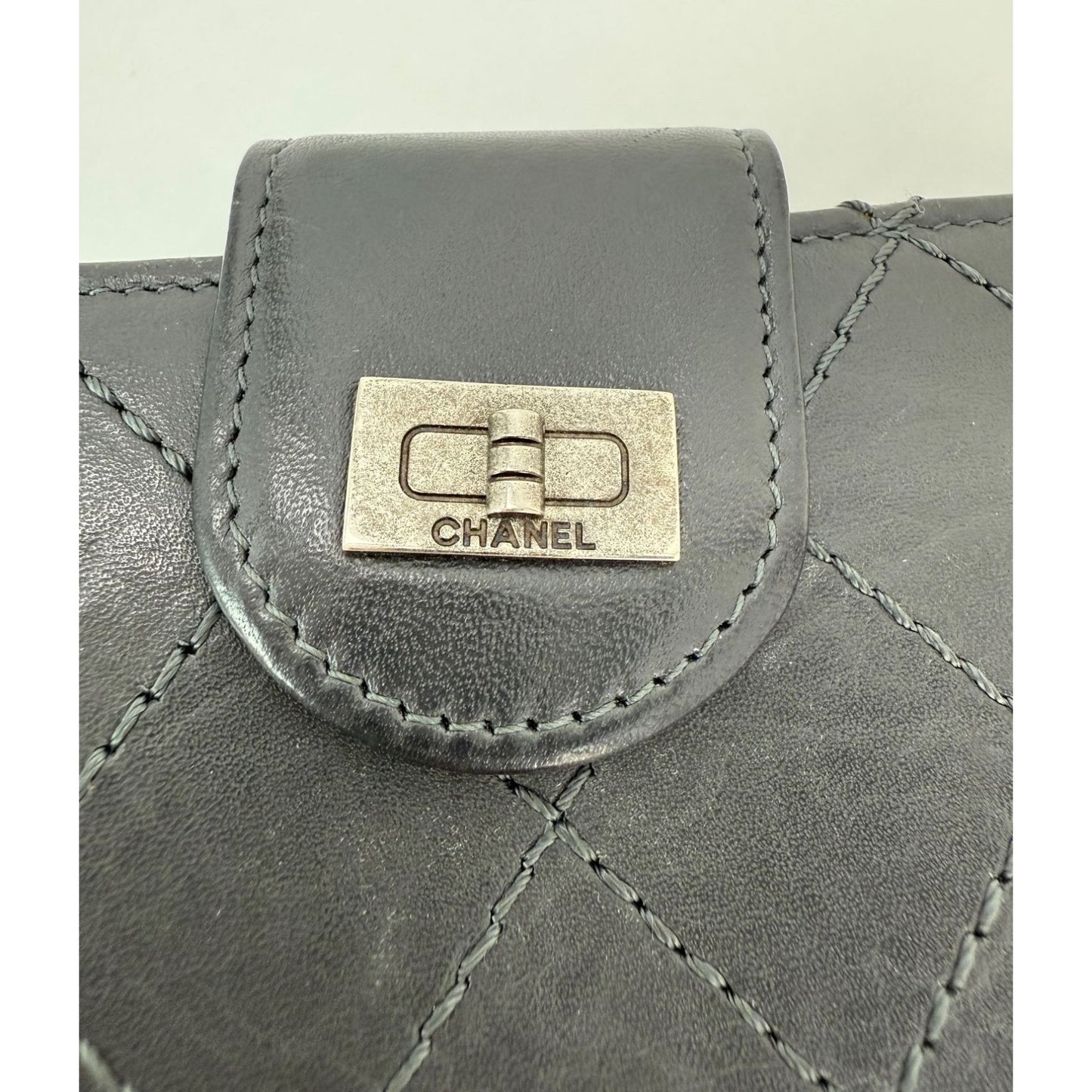 
                  
                    Chanel aged calfskin 2.55 Reissue Zip Gray Compact Wallet
                  
                