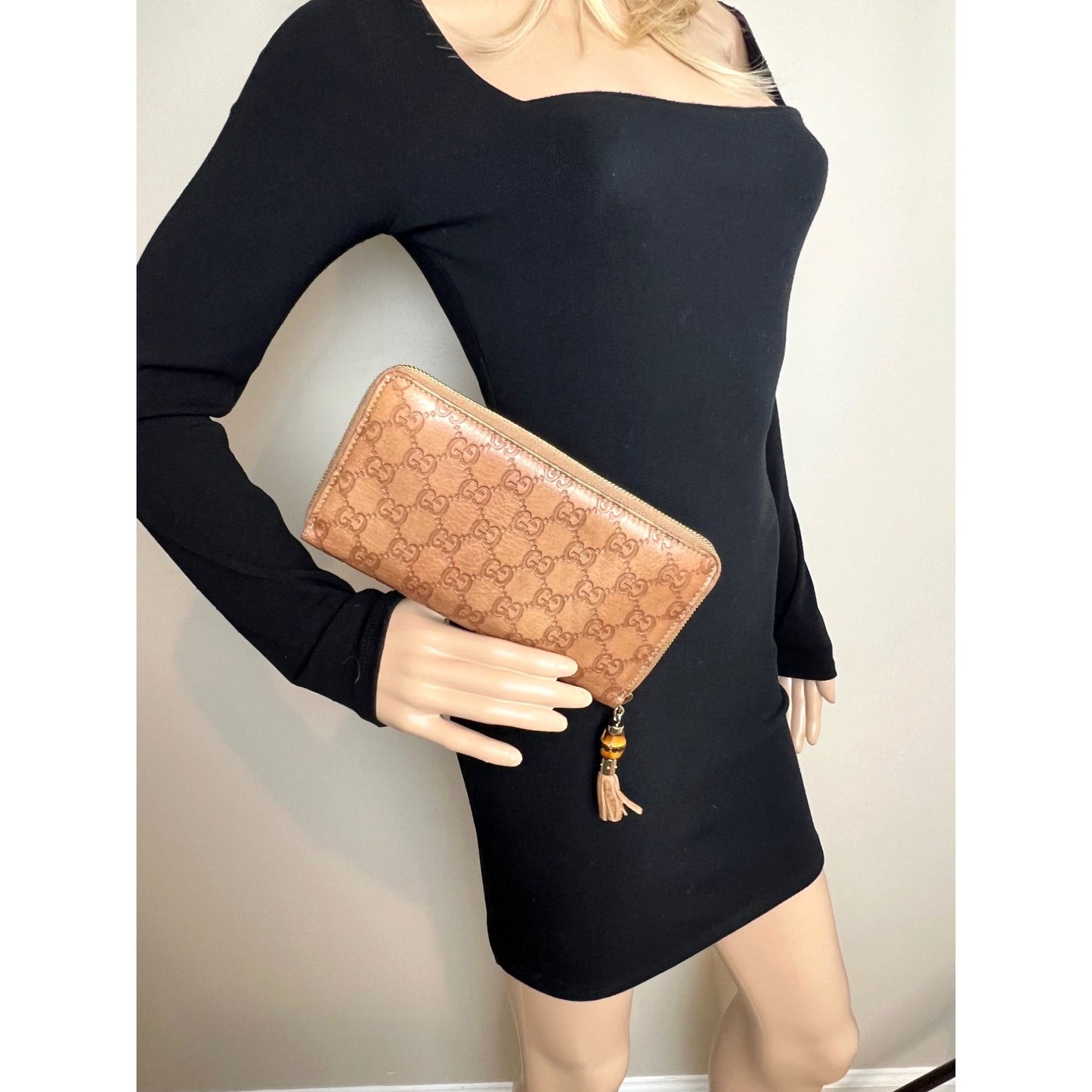 
                  
                    Gucci GG Guccisima Leather Bamboo Tassel Zippy Wallet Clutch
                  
                