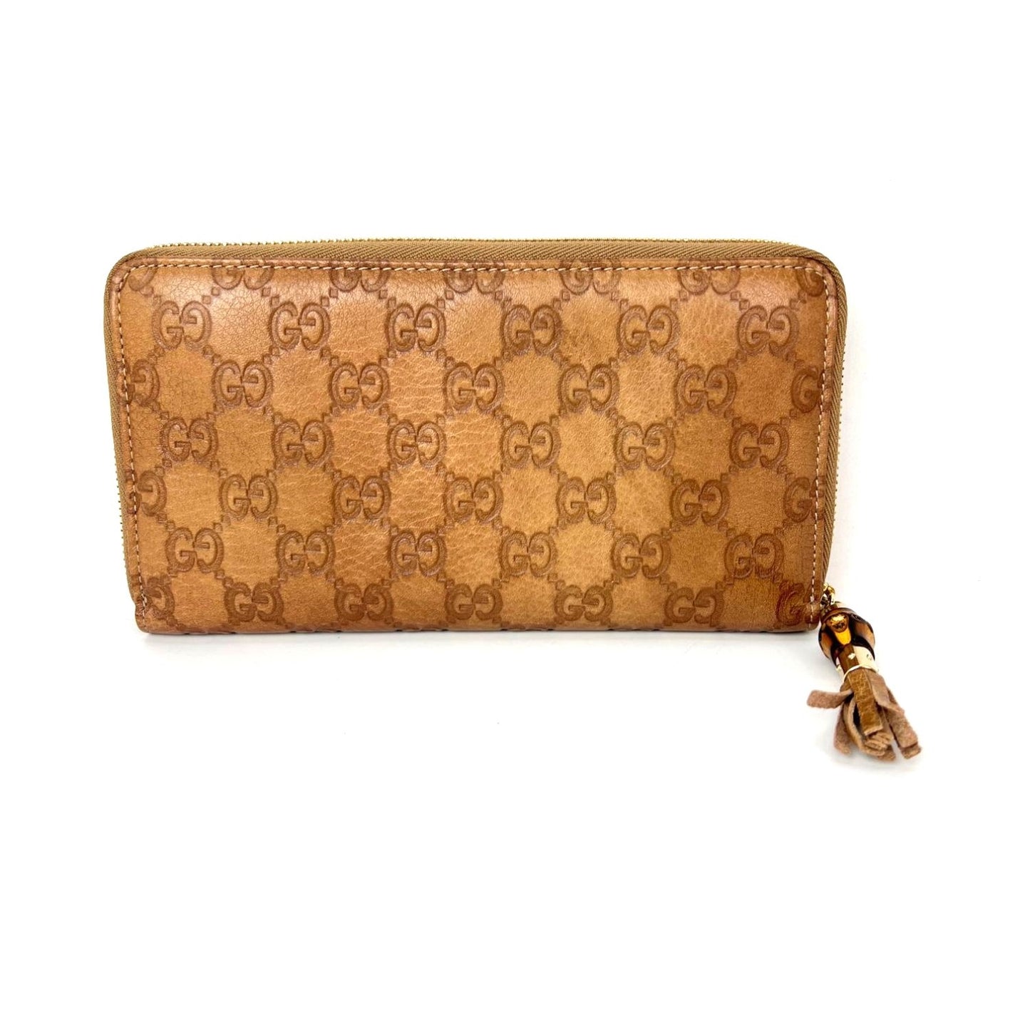 
                  
                    Gucci GG Guccisima Leather Bamboo Tassel Zippy Wallet Clutch
                  
                