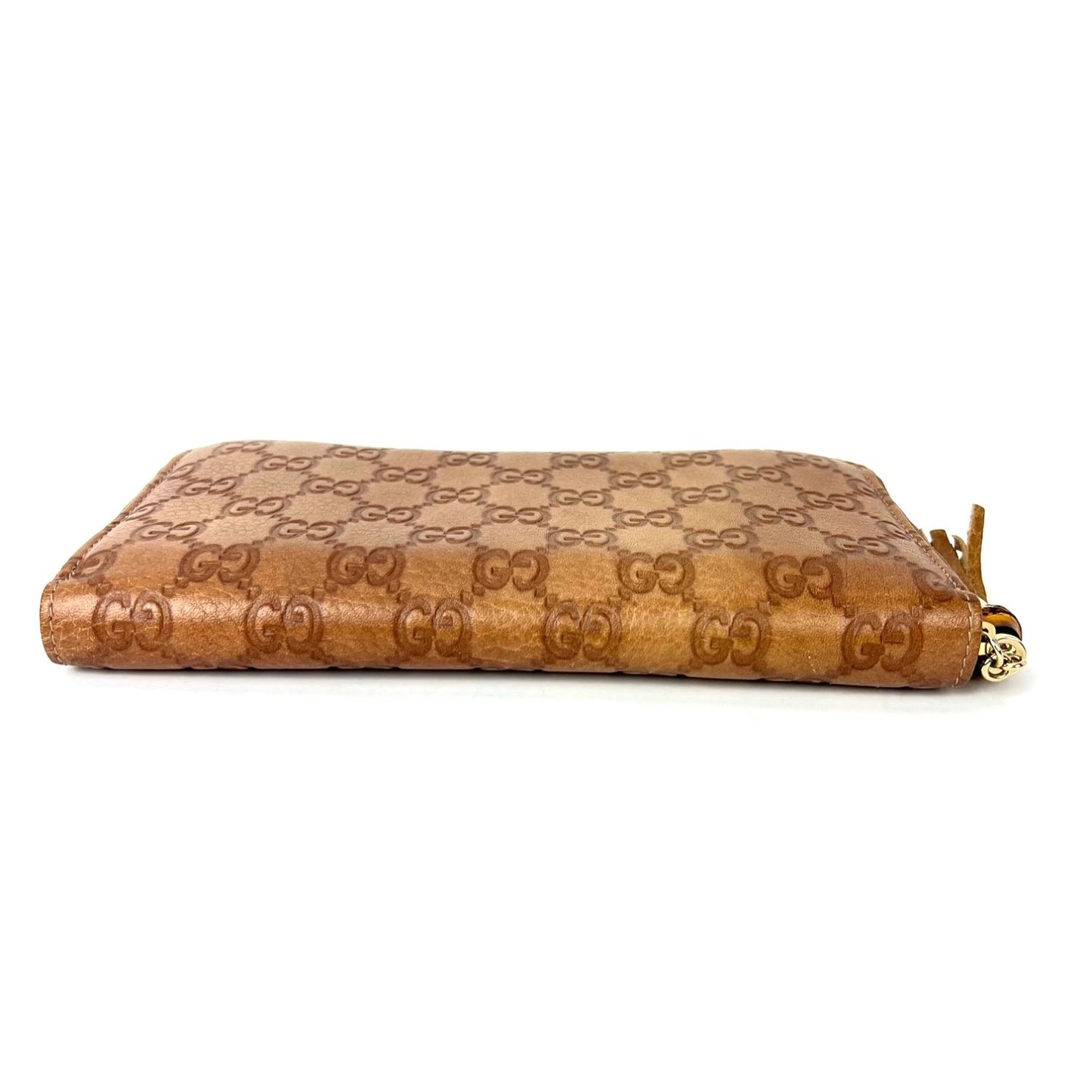 
                  
                    Gucci GG Guccisima Leather Bamboo Tassel Zippy Wallet Clutch
                  
                