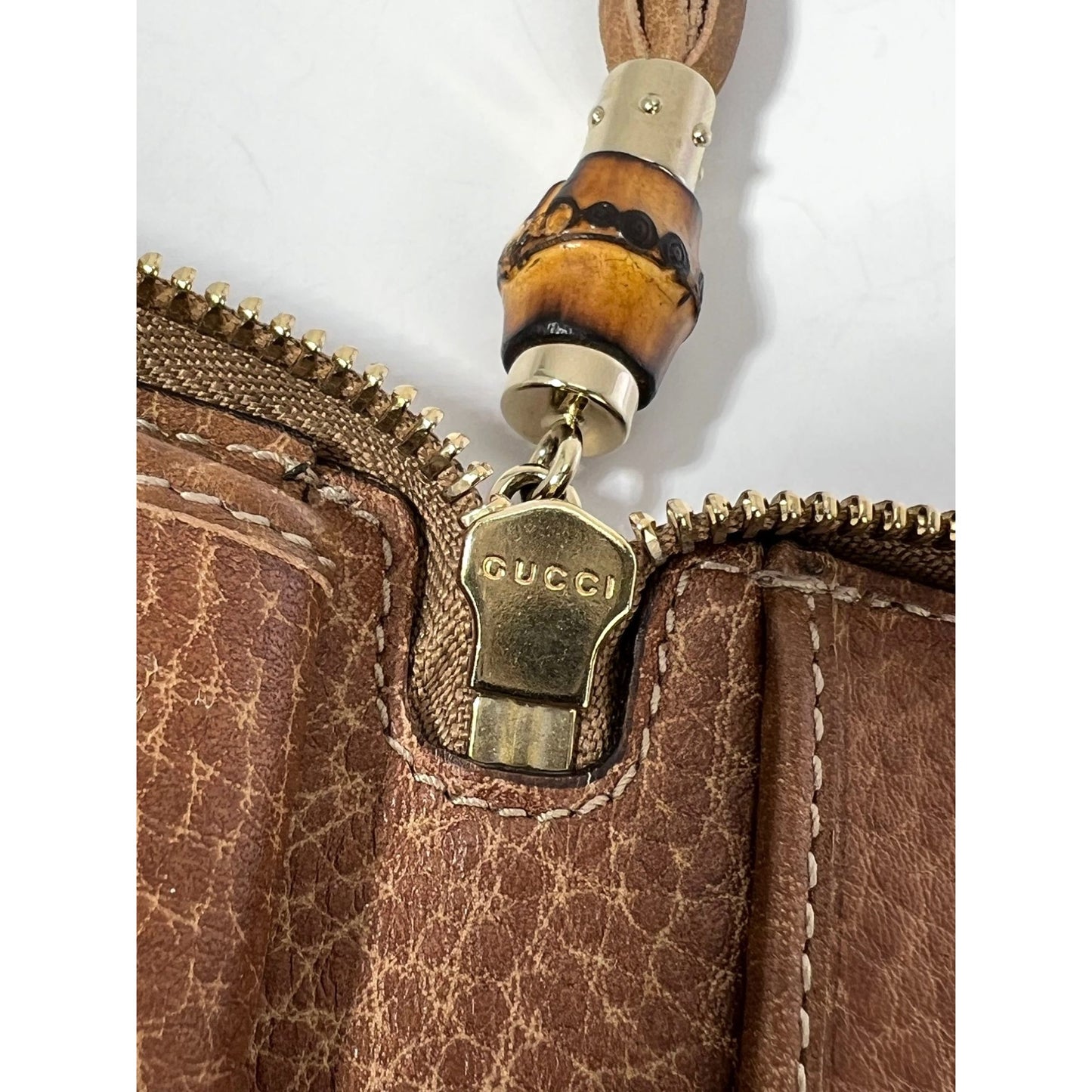 
                  
                    Gucci GG Guccisima Leather Bamboo Tassel Zippy Wallet Clutch
                  
                