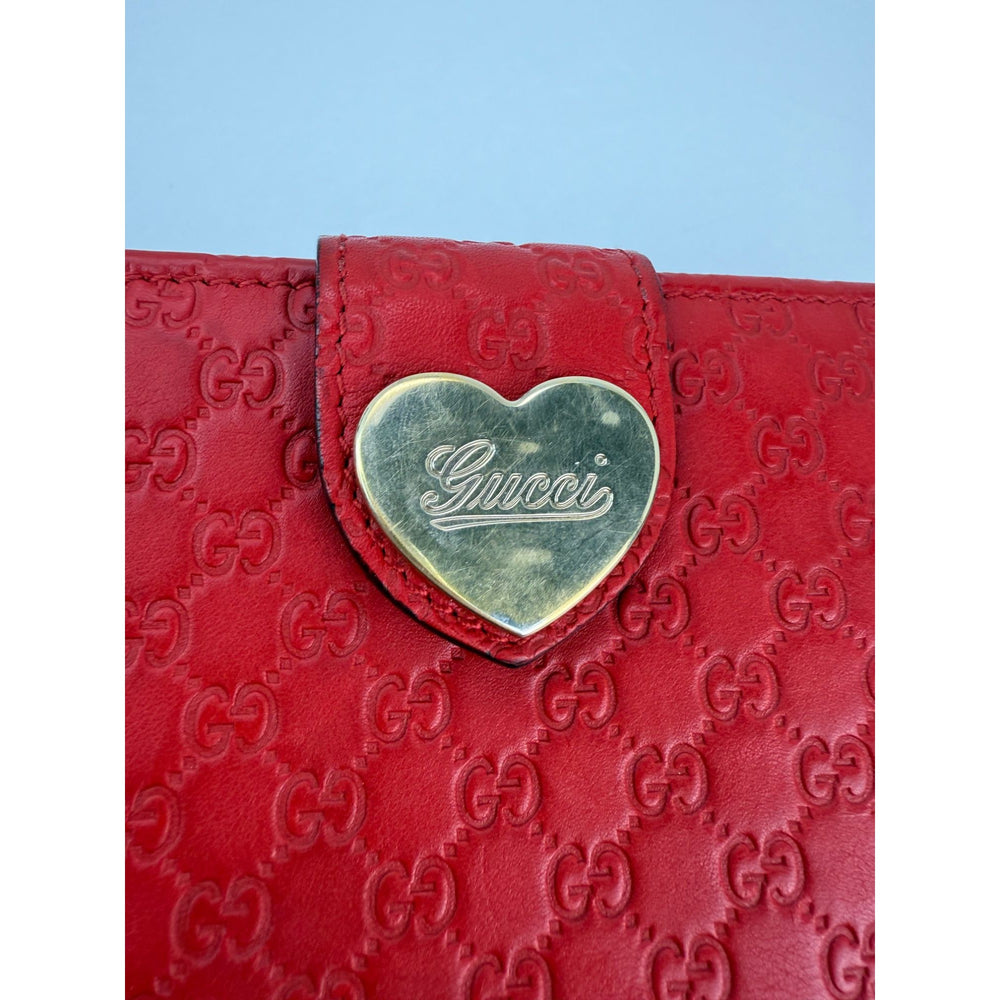 
                  
                    Gucci Microguccissima Heart Continental Red Leather Wallet
                  
                