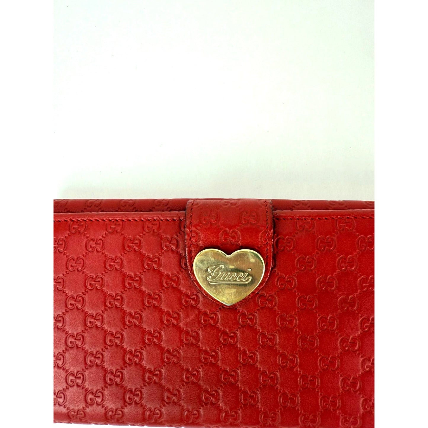 
                  
                    Gucci Microguccissima Heart Continental Red Leather Wallet
                  
                