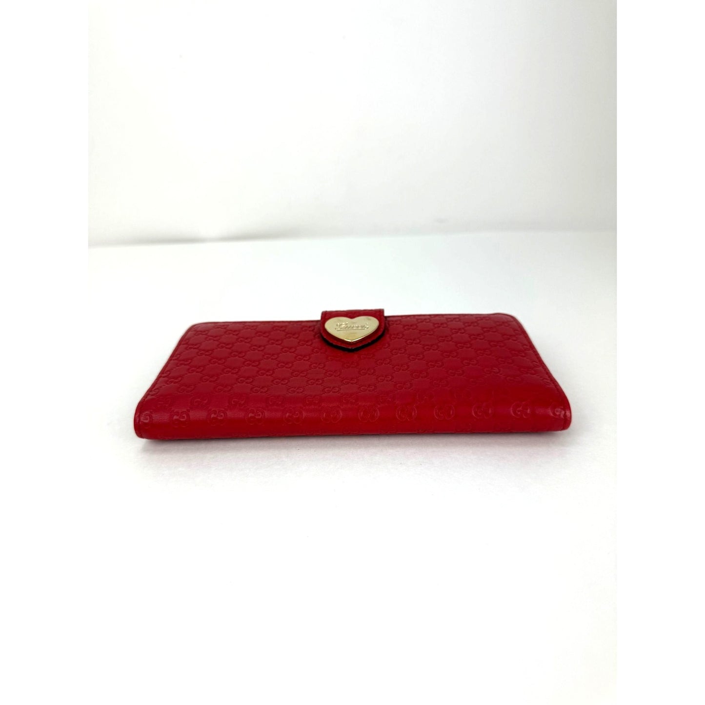 
                  
                    Gucci Microguccissima Heart Continental Red Leather Wallet
                  
                
