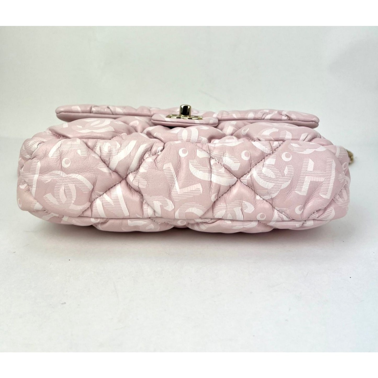 
                  
                    Chanel Printed Calfskin Quilted Medium Puffy Bubbly CC Pink Flap Bag
                  
                