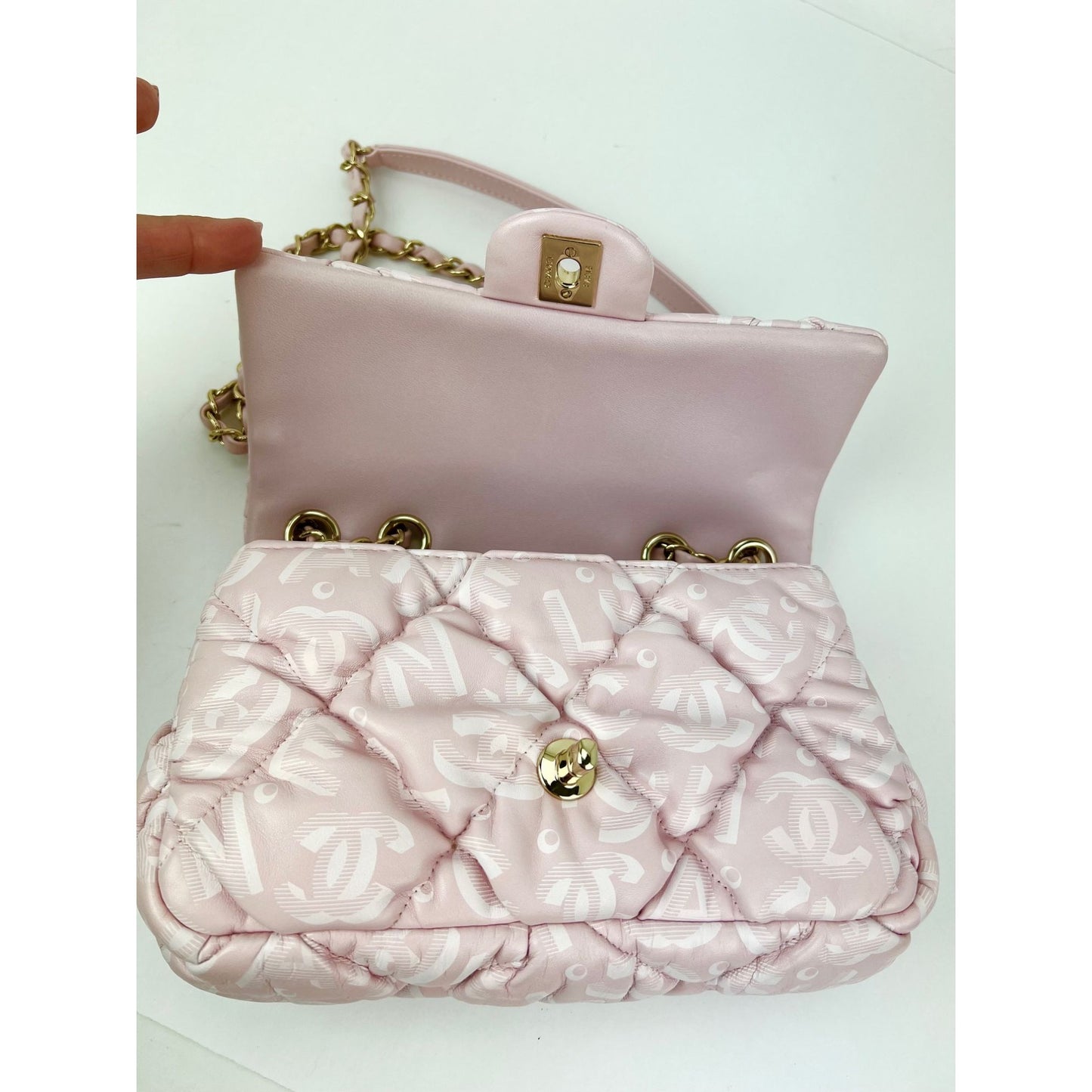
                  
                    Chanel Printed Calfskin Quilted Medium Puffy Bubbly CC Pink Flap Bag
                  
                