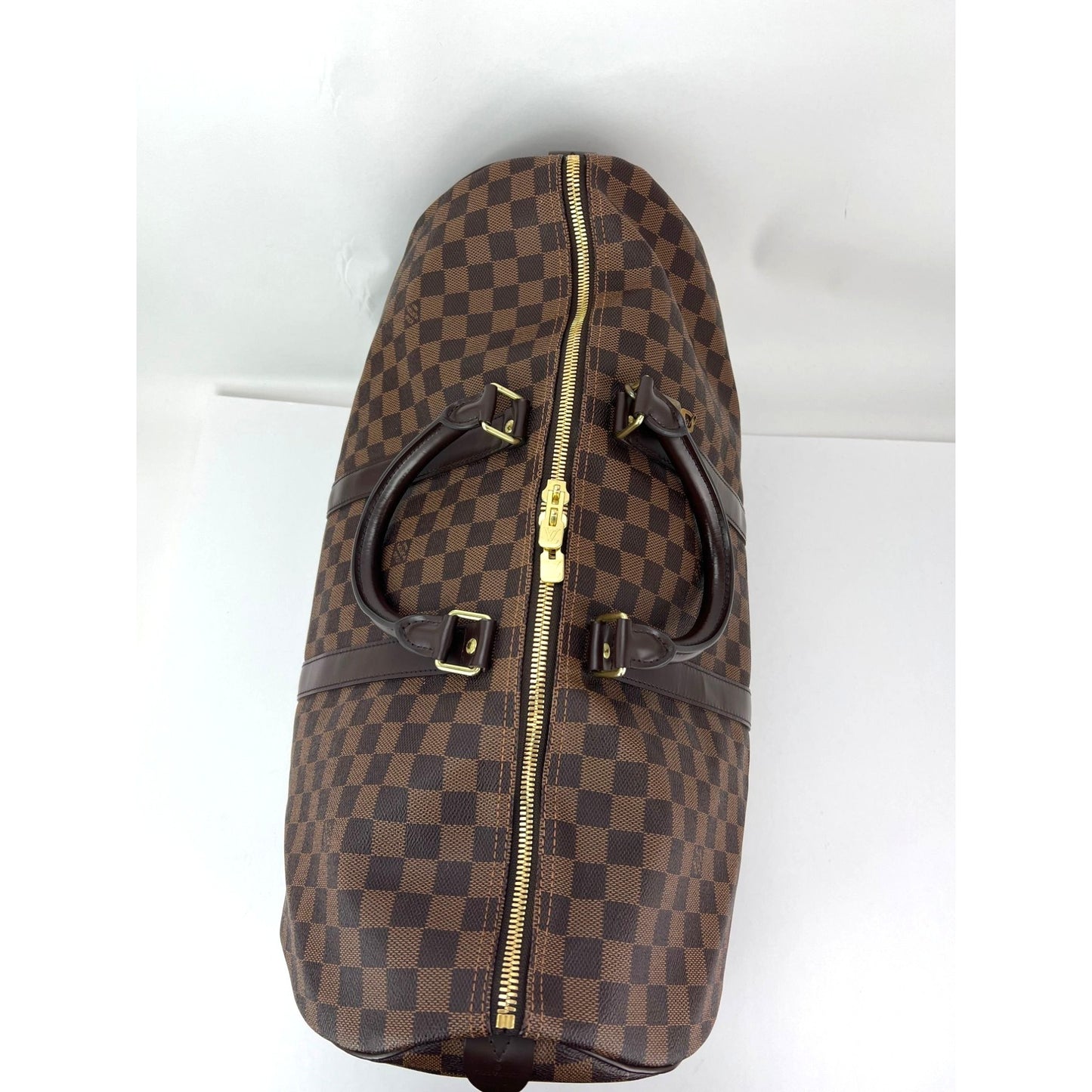 
                  
                    Louis Vuitton Keepall 50 Damier Ebene Canvas Duffle Bag
                  
                