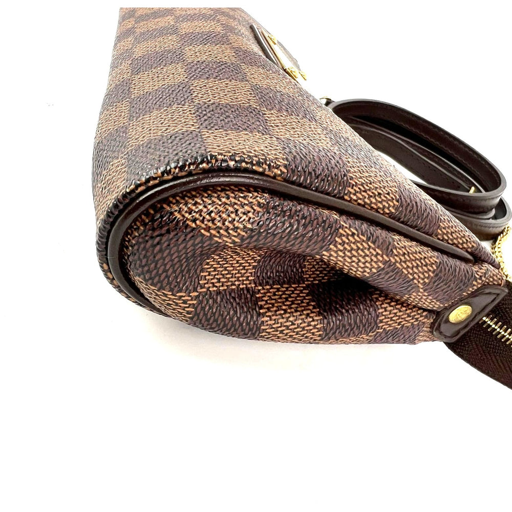 
                  
                    Louis Vuitton Eva Damier Ebene Canvas Shoulder Cross body
                  
                