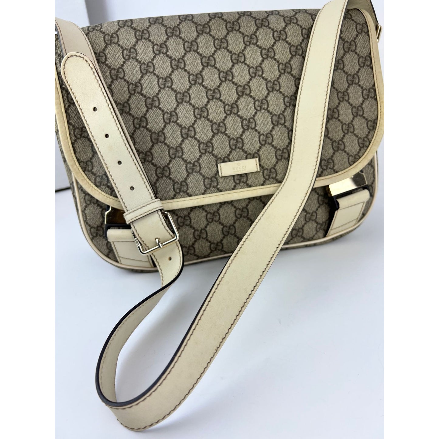 
                  
                    Gucci GG Supreme Medium Double Buckle Messenger Flap Bag
                  
                