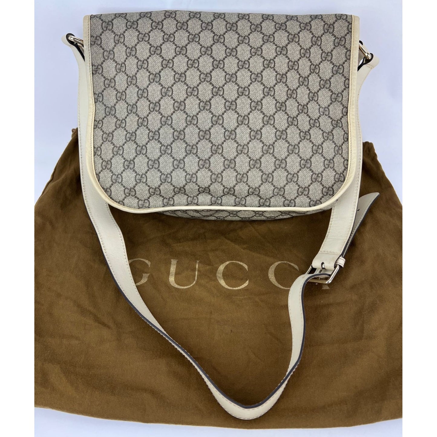 
                  
                    Gucci GG Supreme Medium Double Buckle Messenger Flap Bag
                  
                