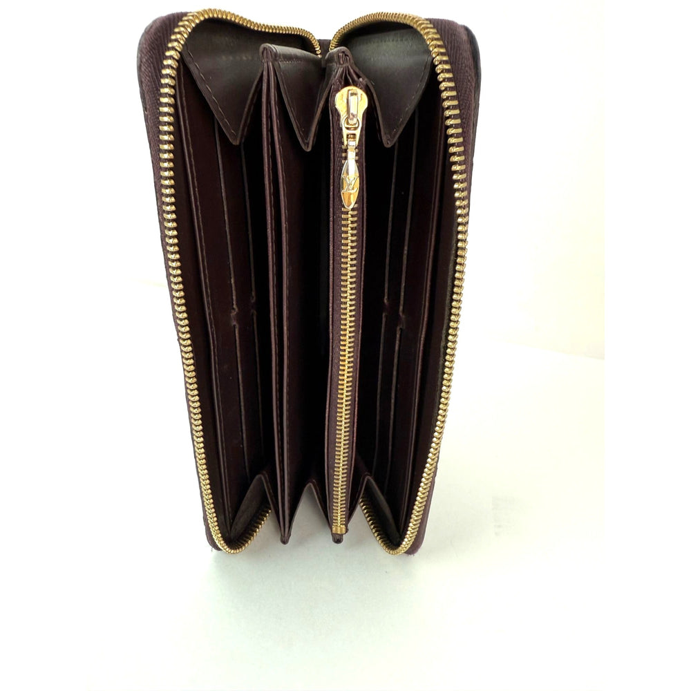 
                  
                    Louis Vuitton Burgundy Vernis Patent Leather Zippy Wallet Clutch
                  
                