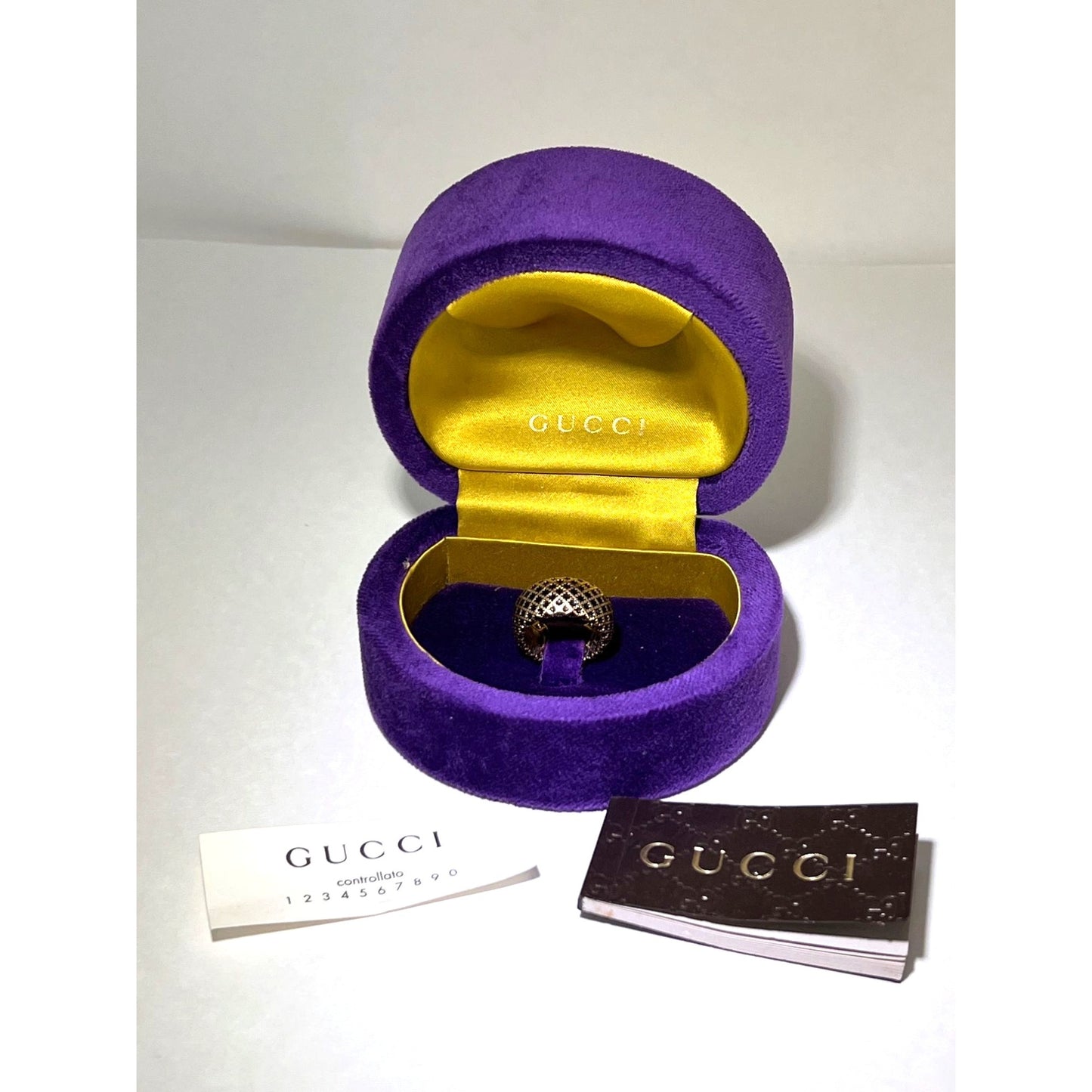 
                  
                    Gucci 18KT Yellow Gold Diamantissima Black Lattice Ring 
                  
                