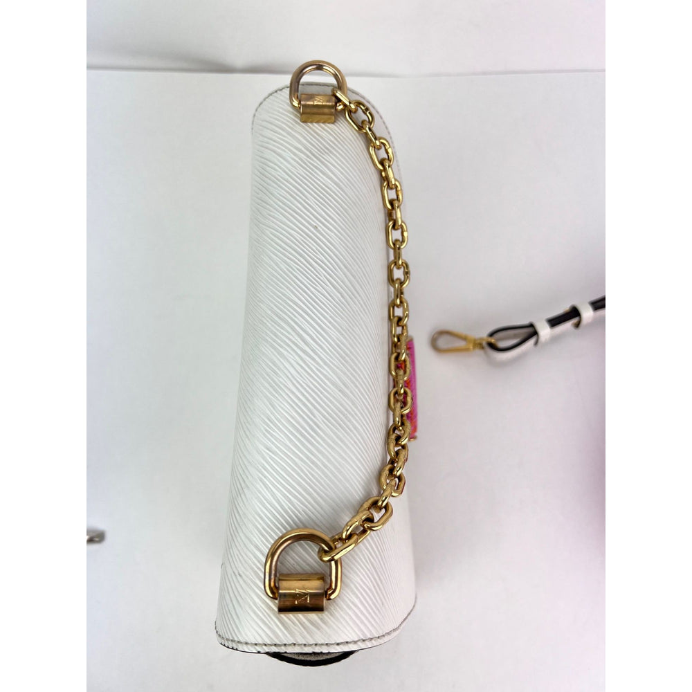 
                  
                    Louis Vuitton Epi White Twist MM Shoulder Bag
                  
                