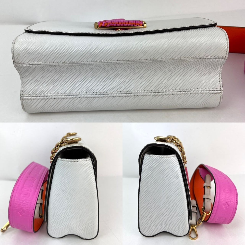 
                  
                    Louis Vuitton Epi White Twist MM Shoulder Bag
                  
                