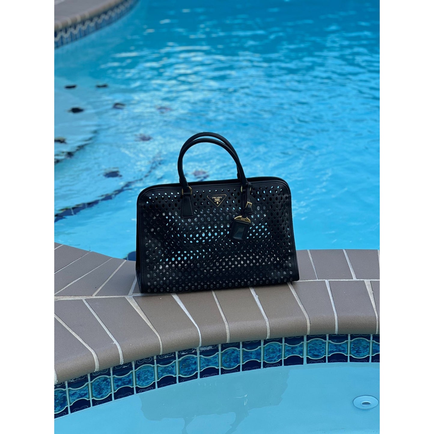 
                  
                    Prada Saffiano Vernice Perforated Black Leather Beach Pool Tote
                  
                