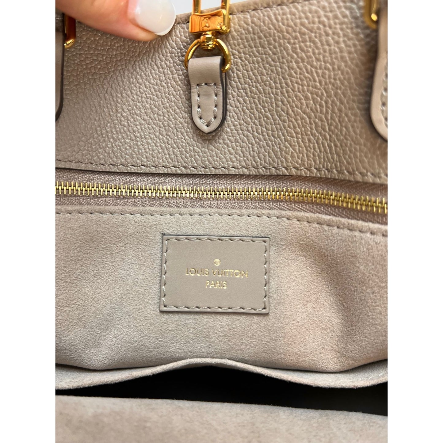 Louis Vuitton on The Go mm, Beige, One Size