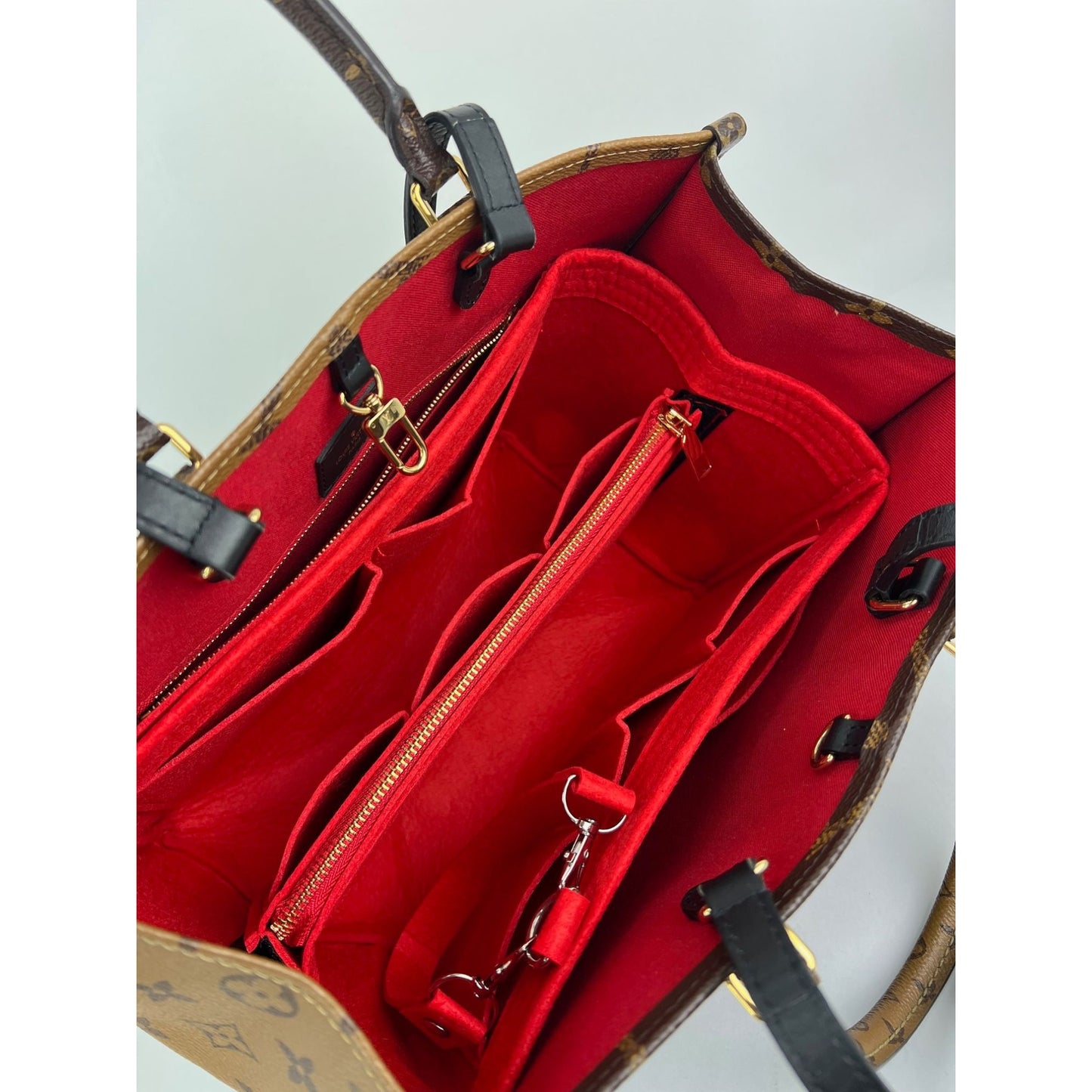 
                  
                    Louis Vuitton ONTHEGO MM Reverse Giant Monogram Tote
                  
                