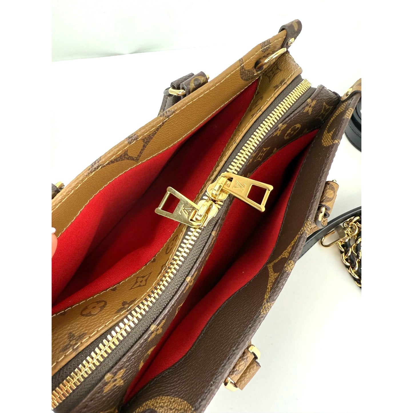 
                  
                    Louis Vuitton Onthego East West Chain Crossbody Shoulder Bag
                  
                