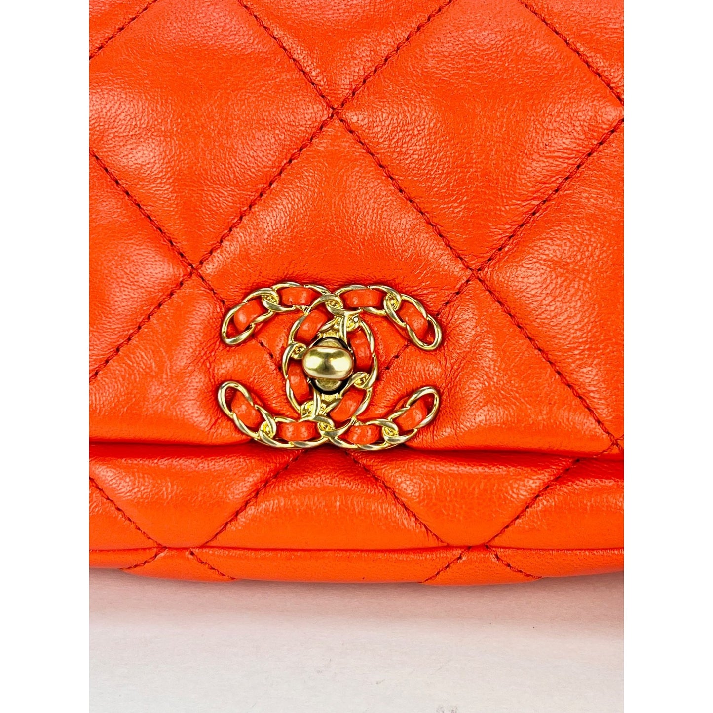 
                  
                    Chanel Goatskin Quilted Chanel 19 Waist Belt Bag Orange
                  
                