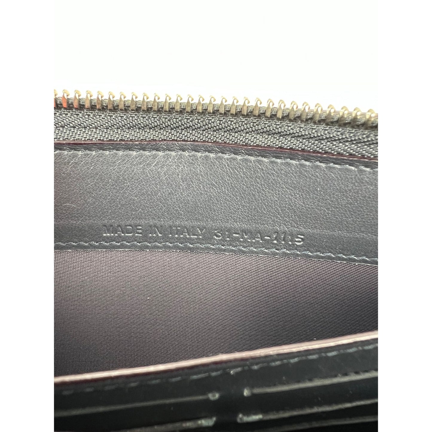 
                  
                    Christian Dior Lady Dior Metallic Blue Grained Leather Zip Around Wallet
                  
                